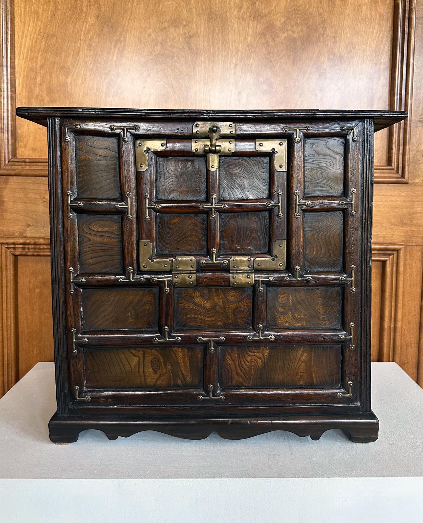 A small Korean wood cabinet dated to the Joseon Dynasty circa 19th century. The cabinet was known as 