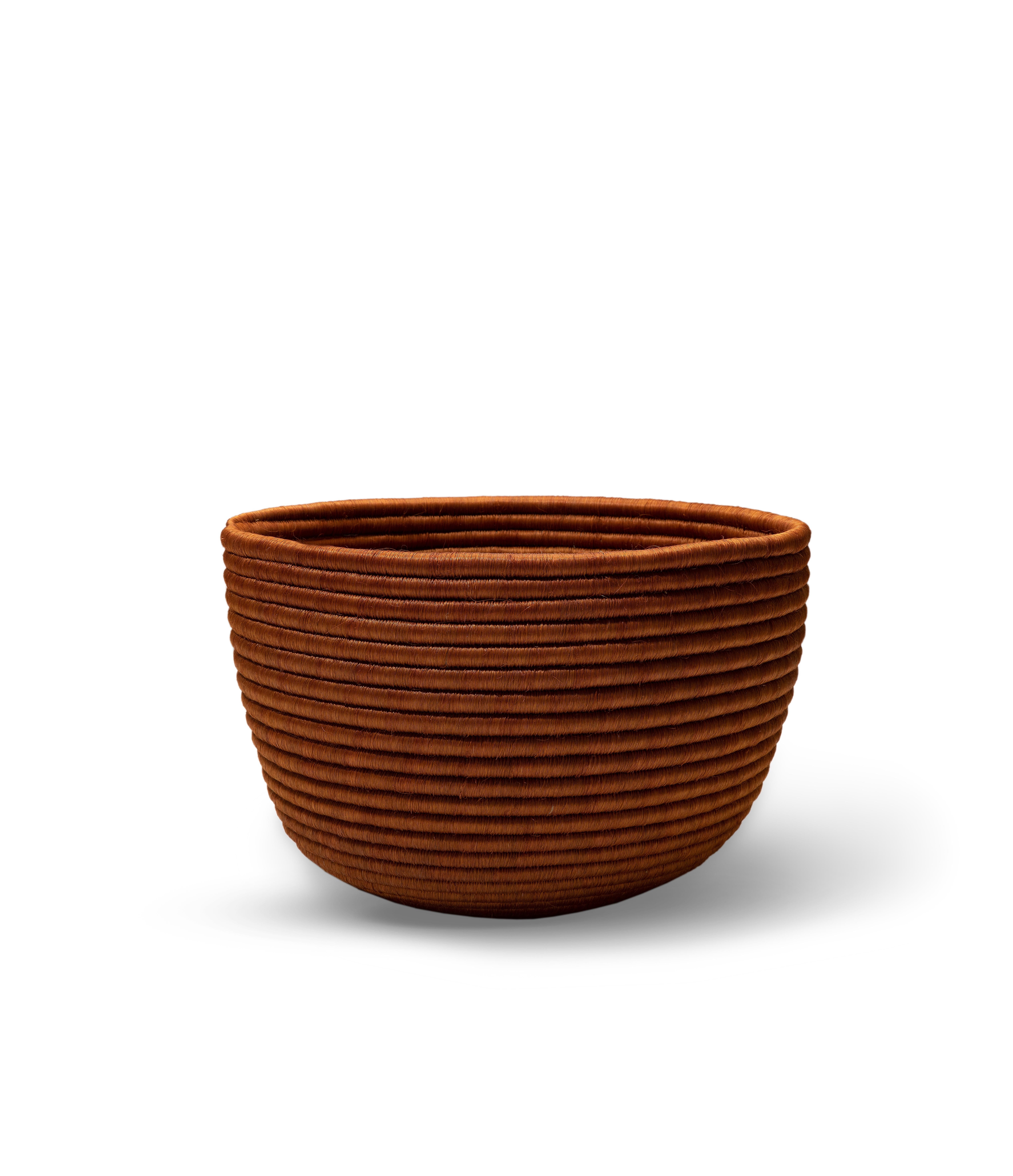Small La Che basket by Sebastian Herkner
Materials: 100 % natural fique agave.
Technique: Hand-woven in Colombia. 
Dimensions: Diameter 43 cm x Height 22 cm 
Available in colors: cobre, olive, black, cuerda. And other sizes.

The La Che basket