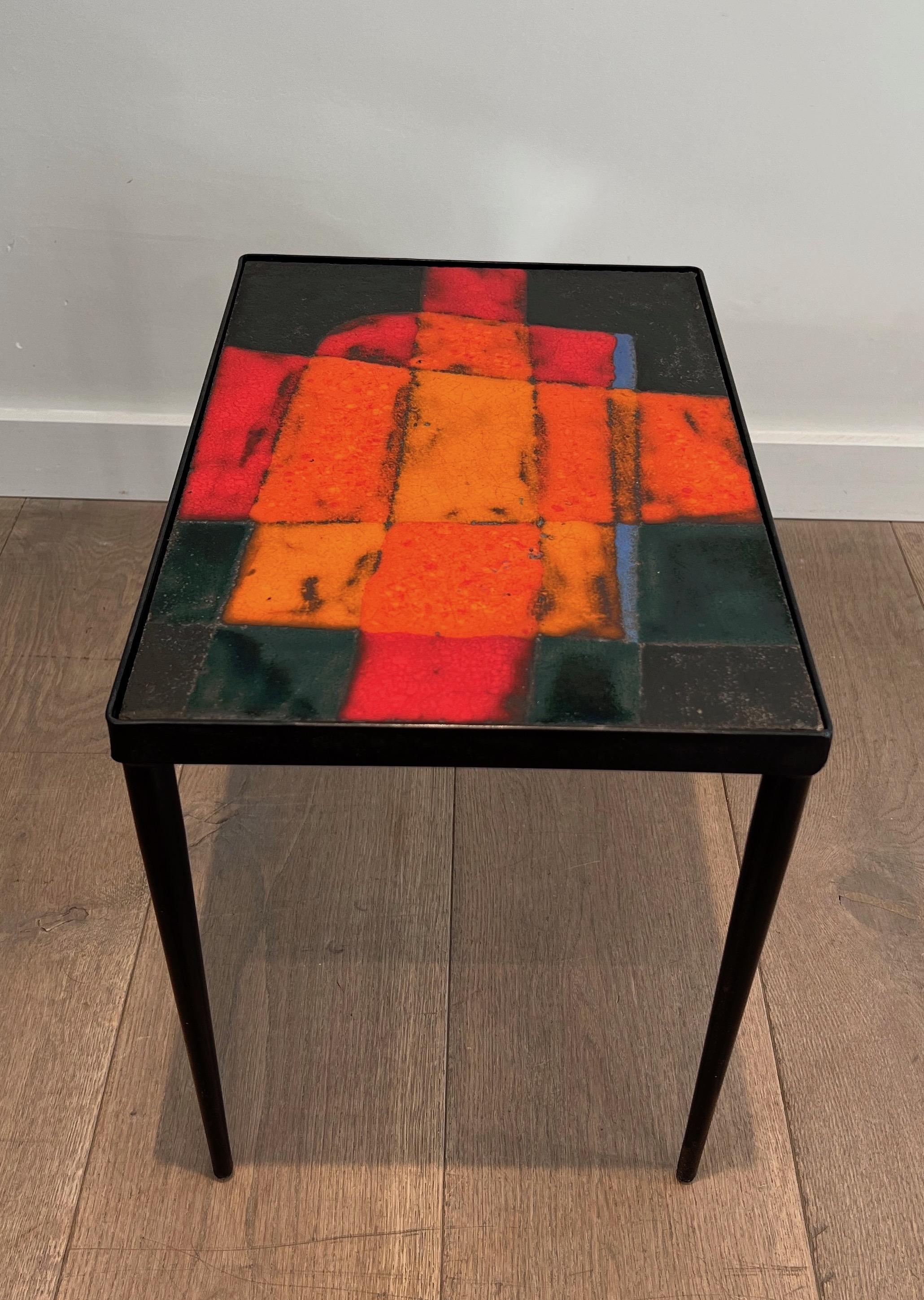Lacquered Small lacquered metal and ceramic side table. French work. Circa 1950 For Sale