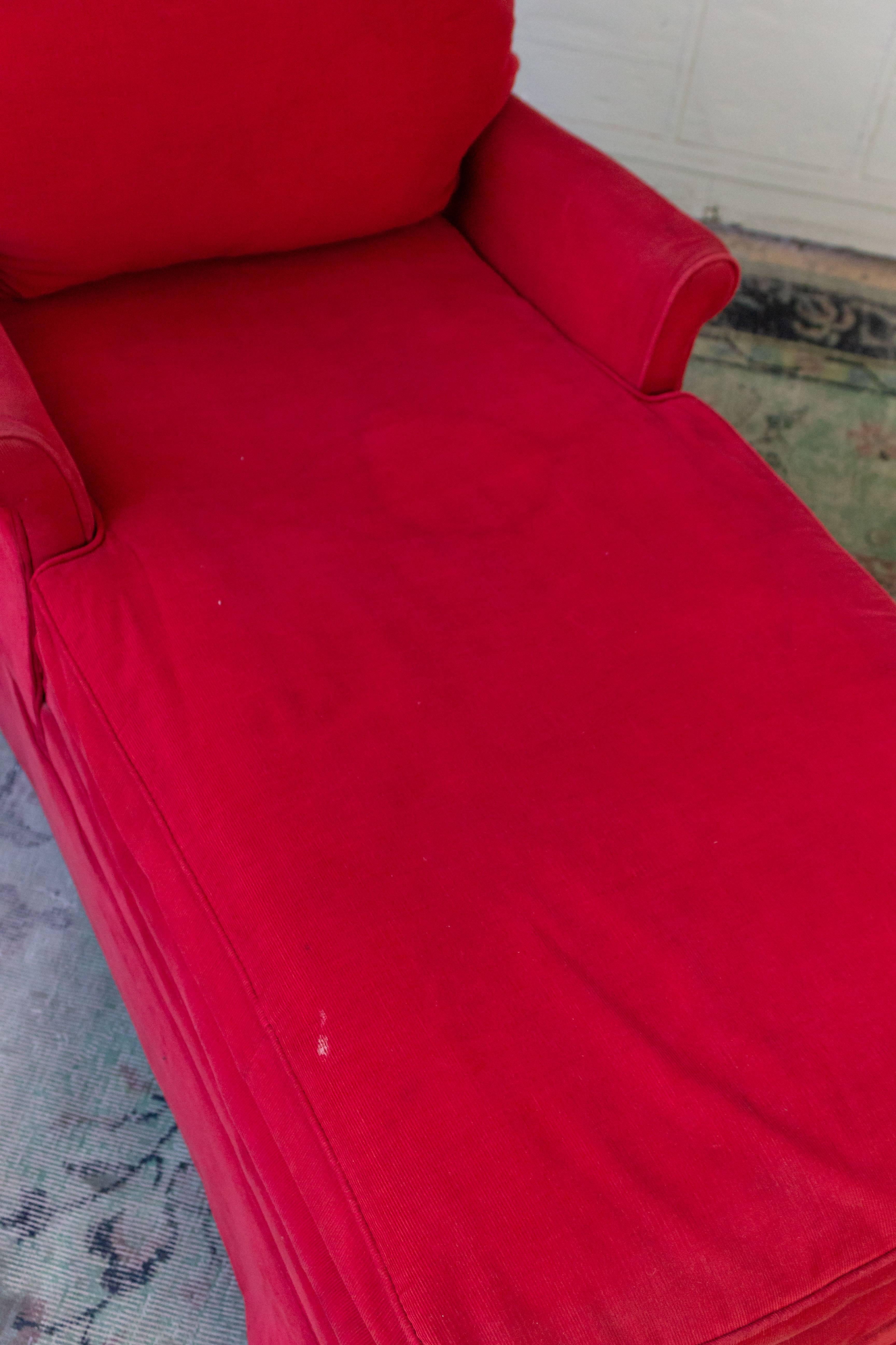 Small-scale American made chaise longue, upholstered in red corduroy.