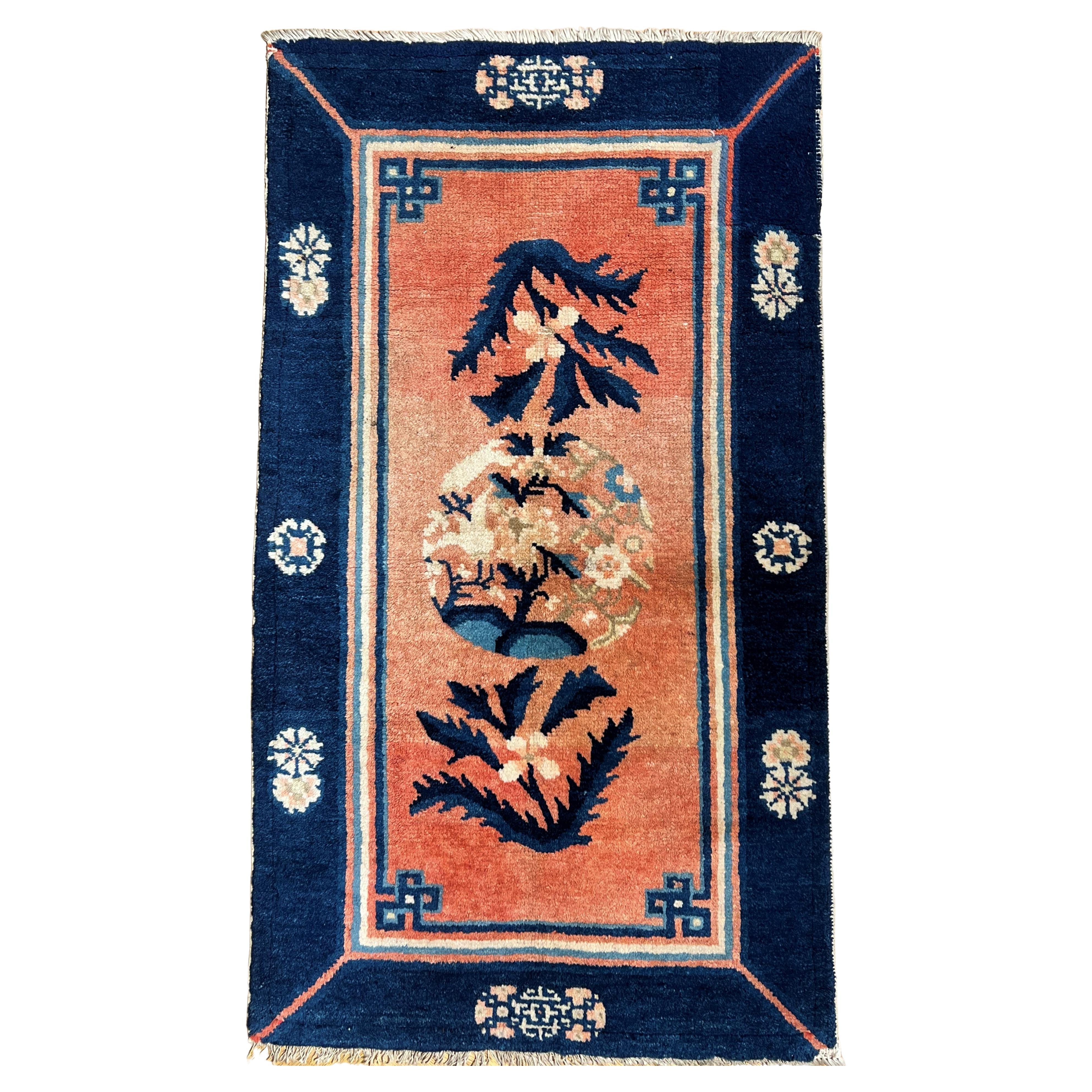 Small Late 19th Century Chinese Carpet with Salmon Pink Ground For Sale