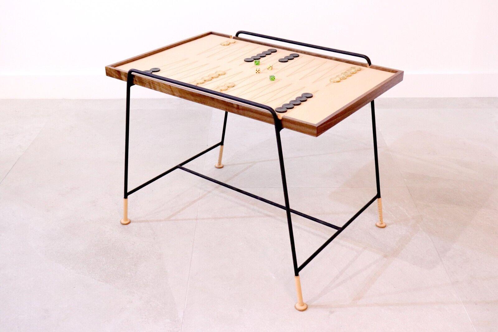 Made to order, these Games tables are of extremely high quality: bespoke made in England, the beautiful walnut and leather finish makes for a sophisticated games experience. reversible top allows for use as a regular table or backgammon board. The