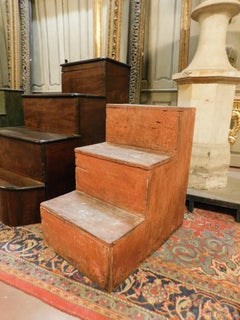 Small library staircase, built in orange lacquered wood, Italy