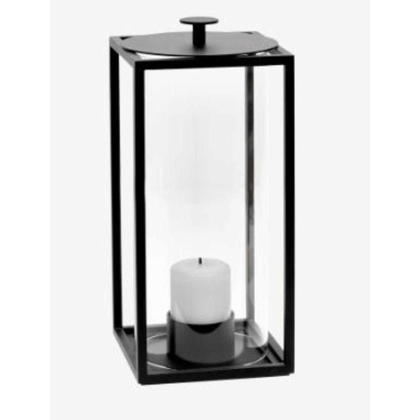 Small light’in lantern by Lassen
Dimensions: D 10 x W 10 x H 20 cm 
Materials: Metal 
Also available in different dimensions. 
Weight: 1.50 kg

With a sharp sense of contemporary Functionalist style, Mogens Lassen designed the iconic Kubus