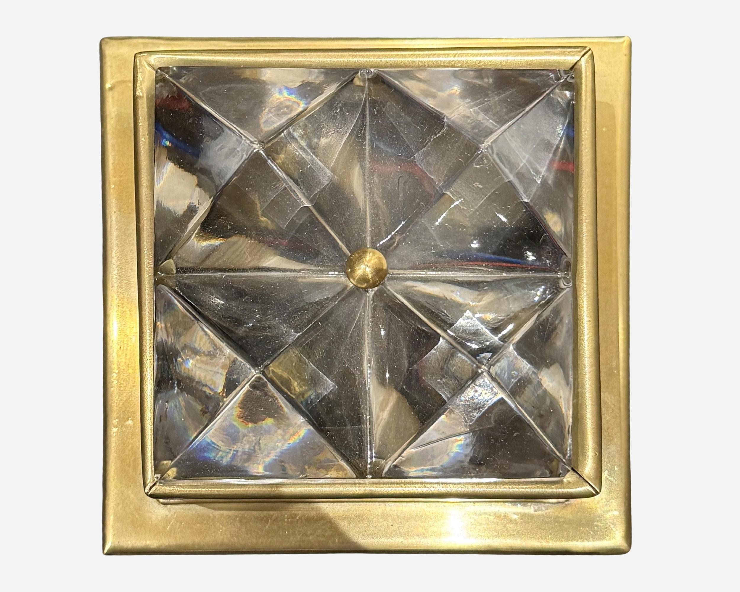 Very important set of small 1970s-era sconces from a palace on the Adriatic.
The mounts are in brass and the lighting part in faceted pressed glass.
Recently re-electrified.
Sold individually or in sets.