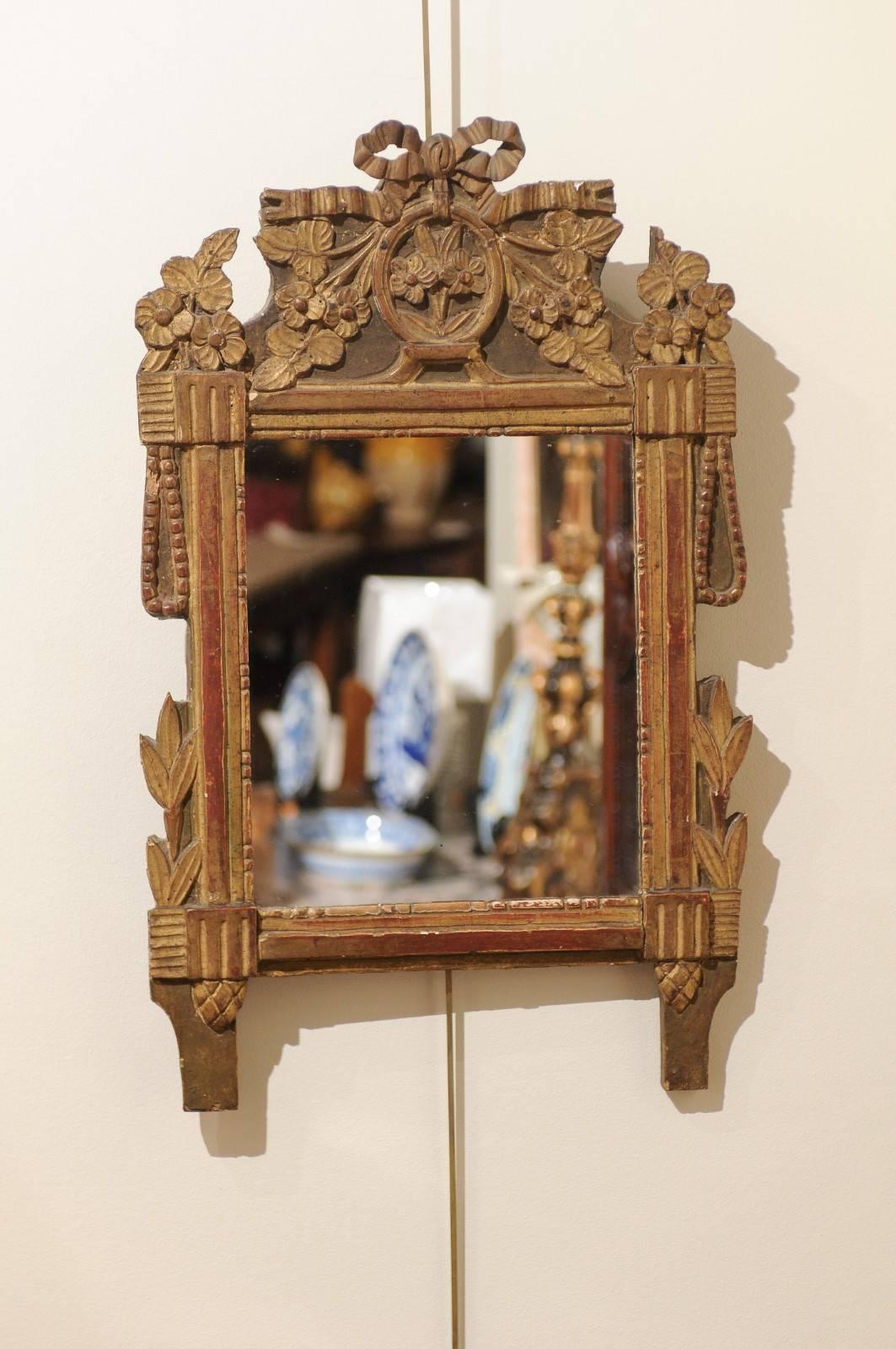 Small Louis XVI style mirror with gilded finish
This is a pretty little mirror with a great finish. Where the gilt has rubbed off over the years, the red undercoat shows through which is always desirable.
It would be possible to add a stand to the