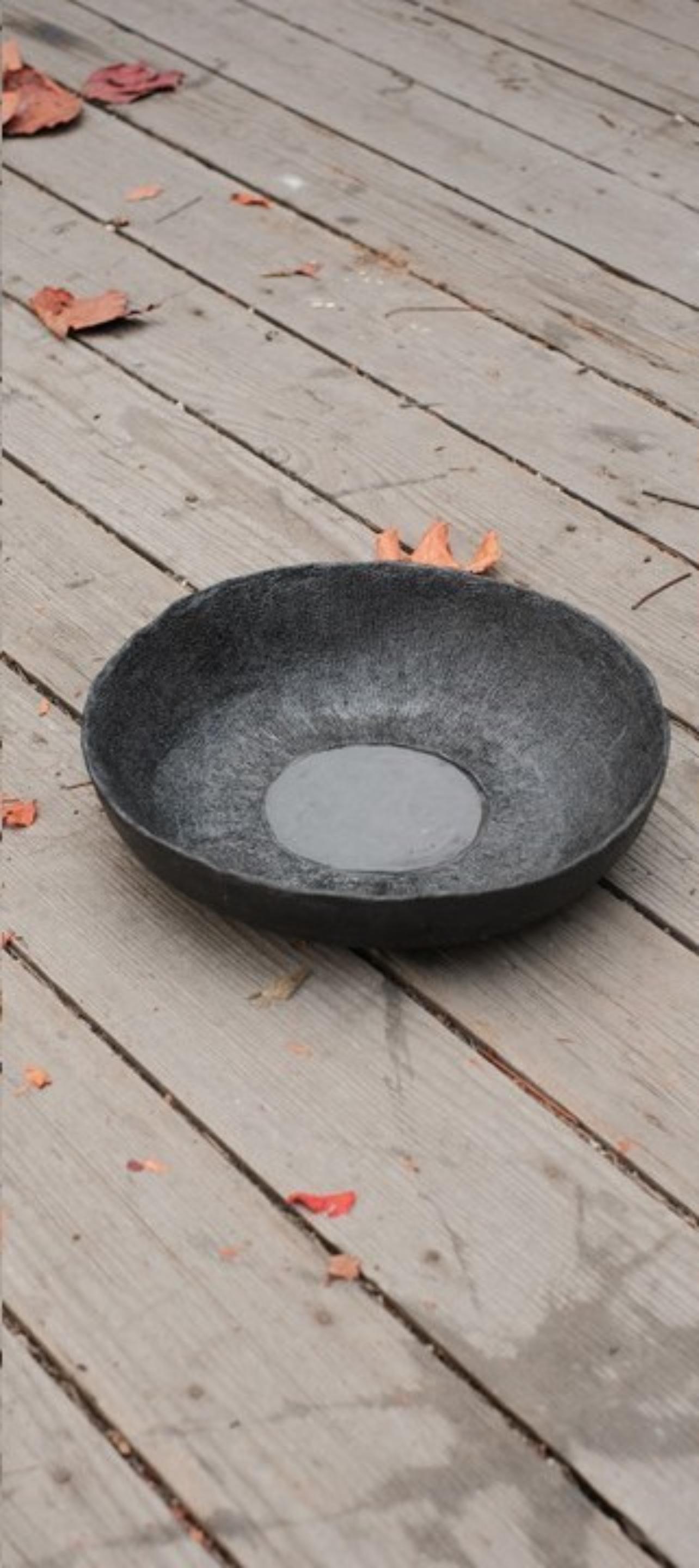 Small, low bowl by Atelier Ledure
Dimensions: D 28 x H 6 cm
Materials: Ceramics - stoneware
Also available: Other variations available.

A Protest Against Polished Stoneware
The BOWLS are the result and expression of a series of experiments