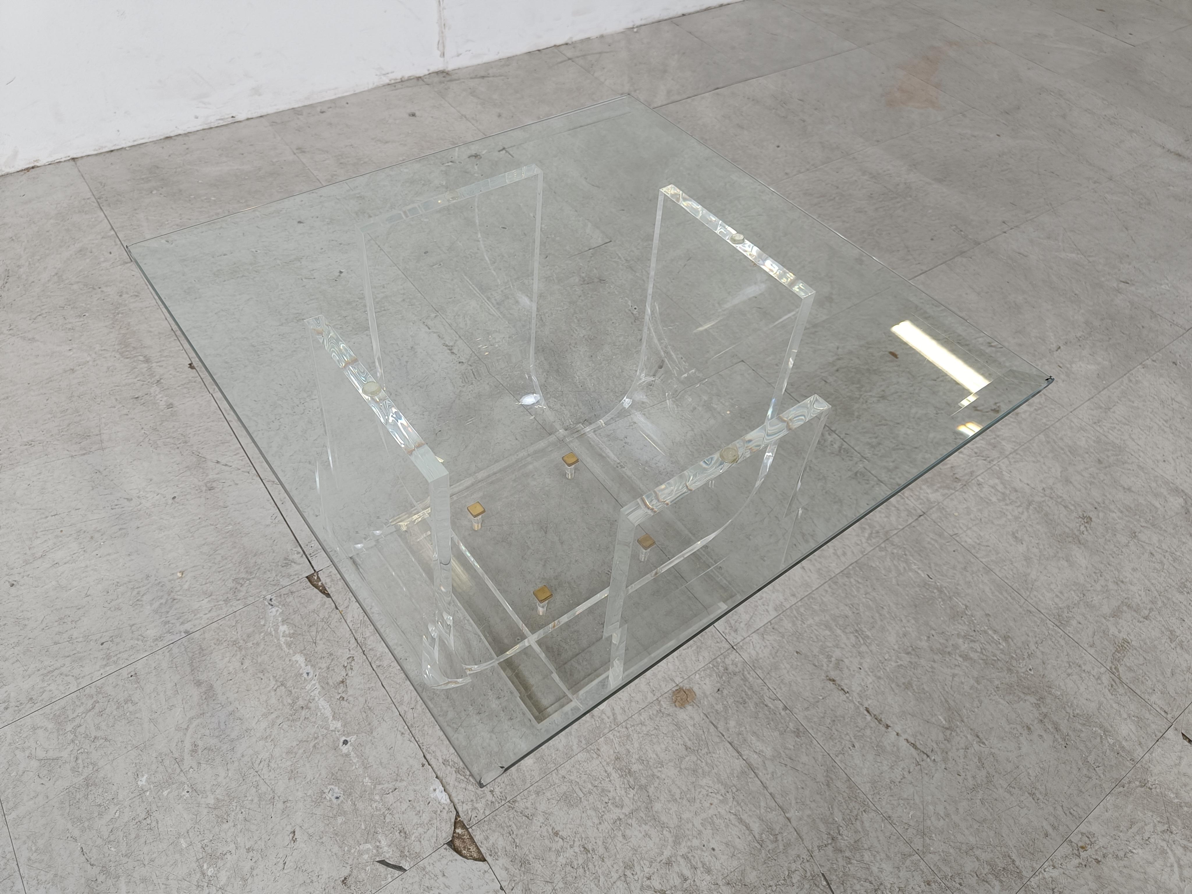 Lovely lucite and glass top coffee table or side table with brass screws.

Very good condition.

1970s - Belgium

Height: 35cm/13.77