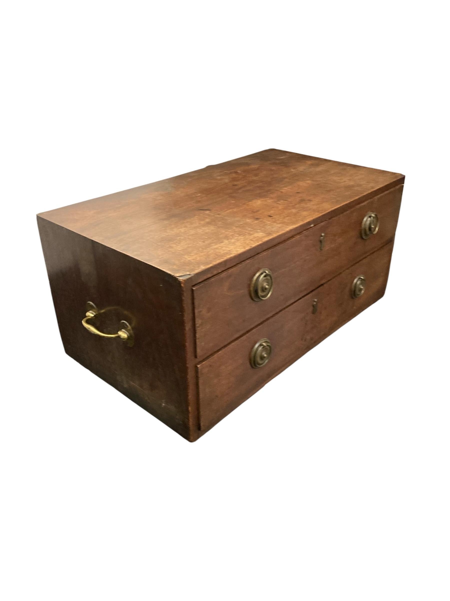 Late 19th Century Small Mahogany Campaign style chest of two drawers CIRCA Late 1800's For Sale