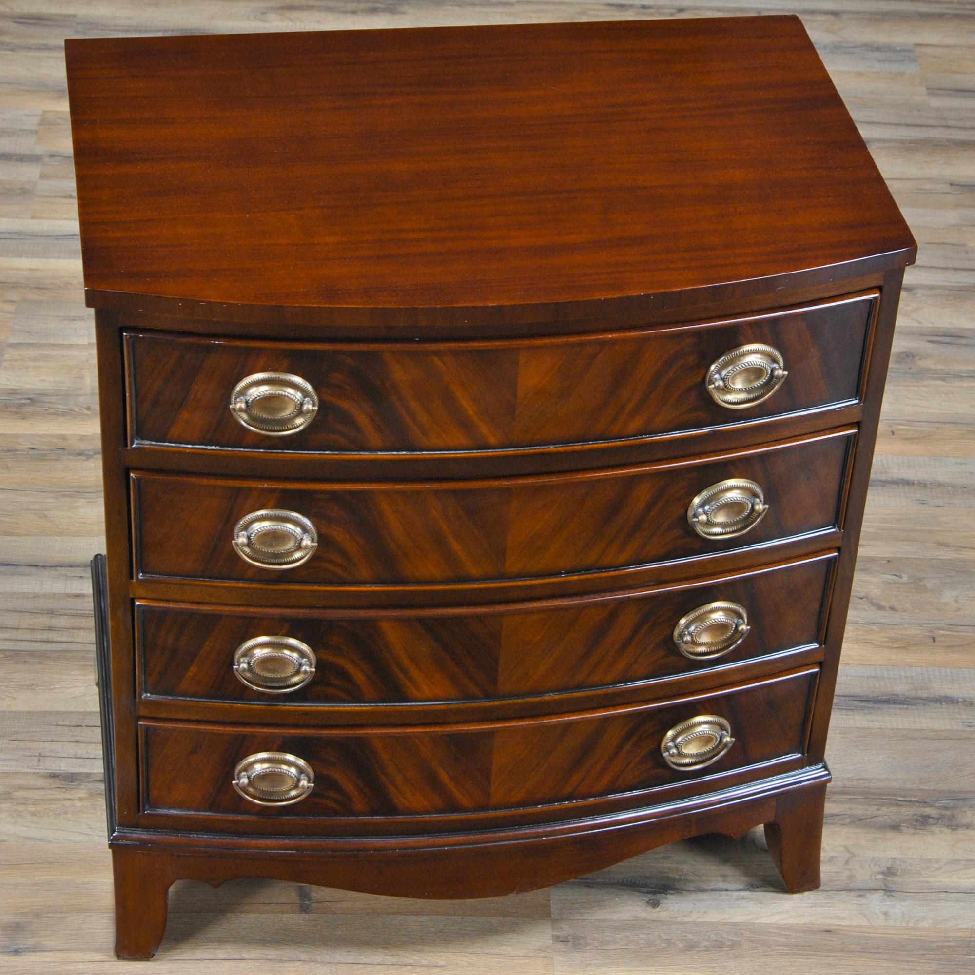 From the tastefully tapered legs to the finely shaped drawer fronts this Small Mahogany Chest with Drawers expresses great taste in design. Graduated drawers, great mahogany veneers and mahogany solids work together to make a wonderful addition to