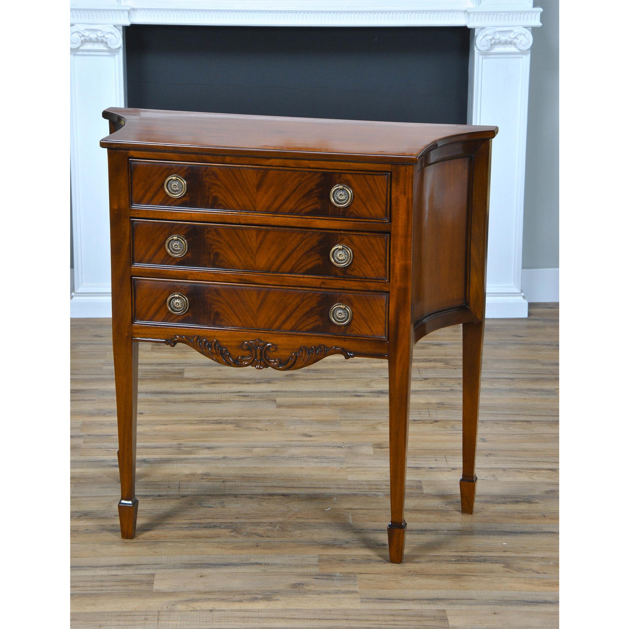 A small mahogany sideboard is perfect size Hepplewhite inspired sideboard is great for those hard to fill spaces in the dining room. The three drawers are dovetailed and feature designer quality, solid brass hardware. The shaped sides lend elegance