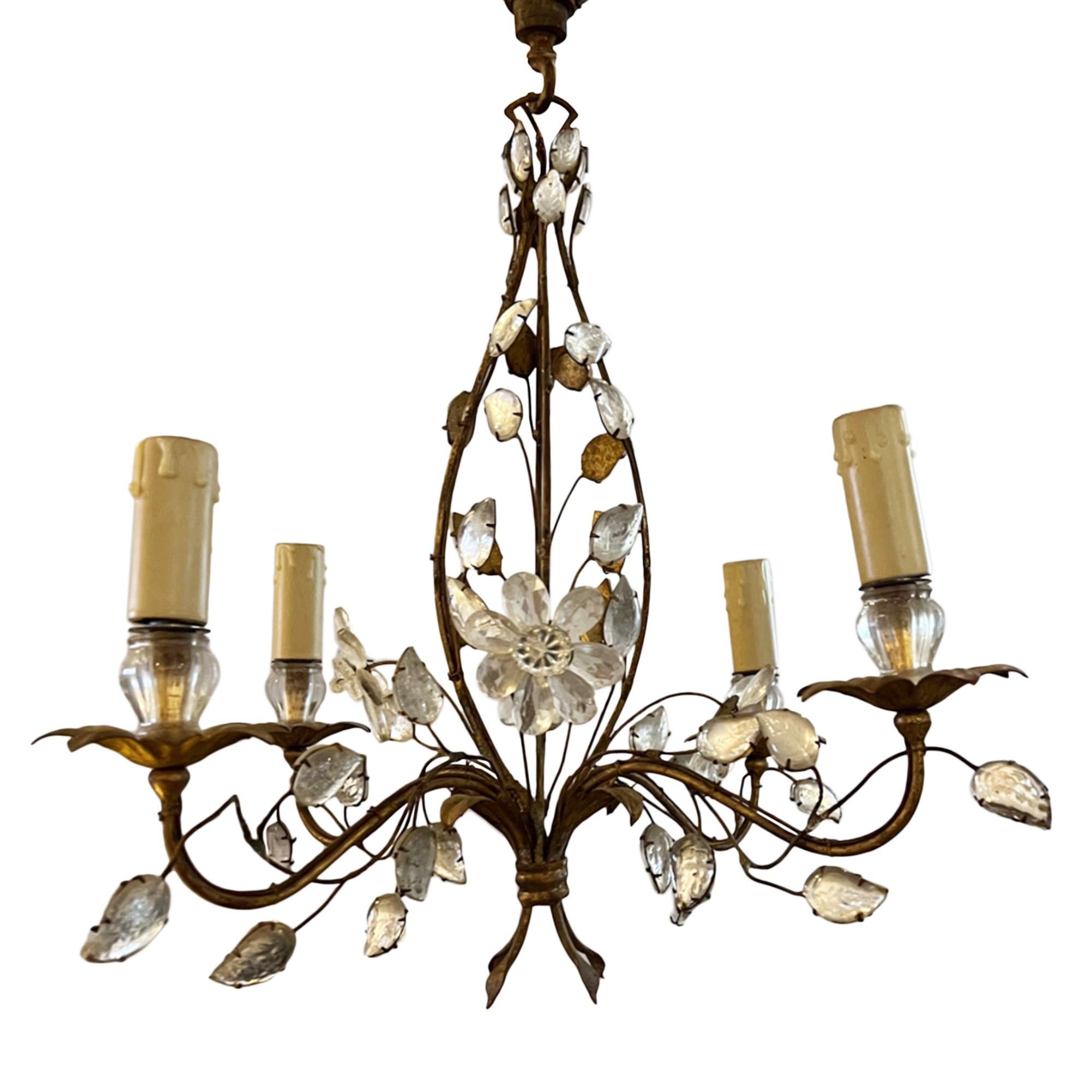 Wonderfully elegant mid 20th century gilt metal and crystal chandelier by Maison Baguès. Made in Paris in the 1960s.

This smaller light has 4 arms, with the light fitting in the shape of an open bud. Decorated with crystal leaves and flowers - this