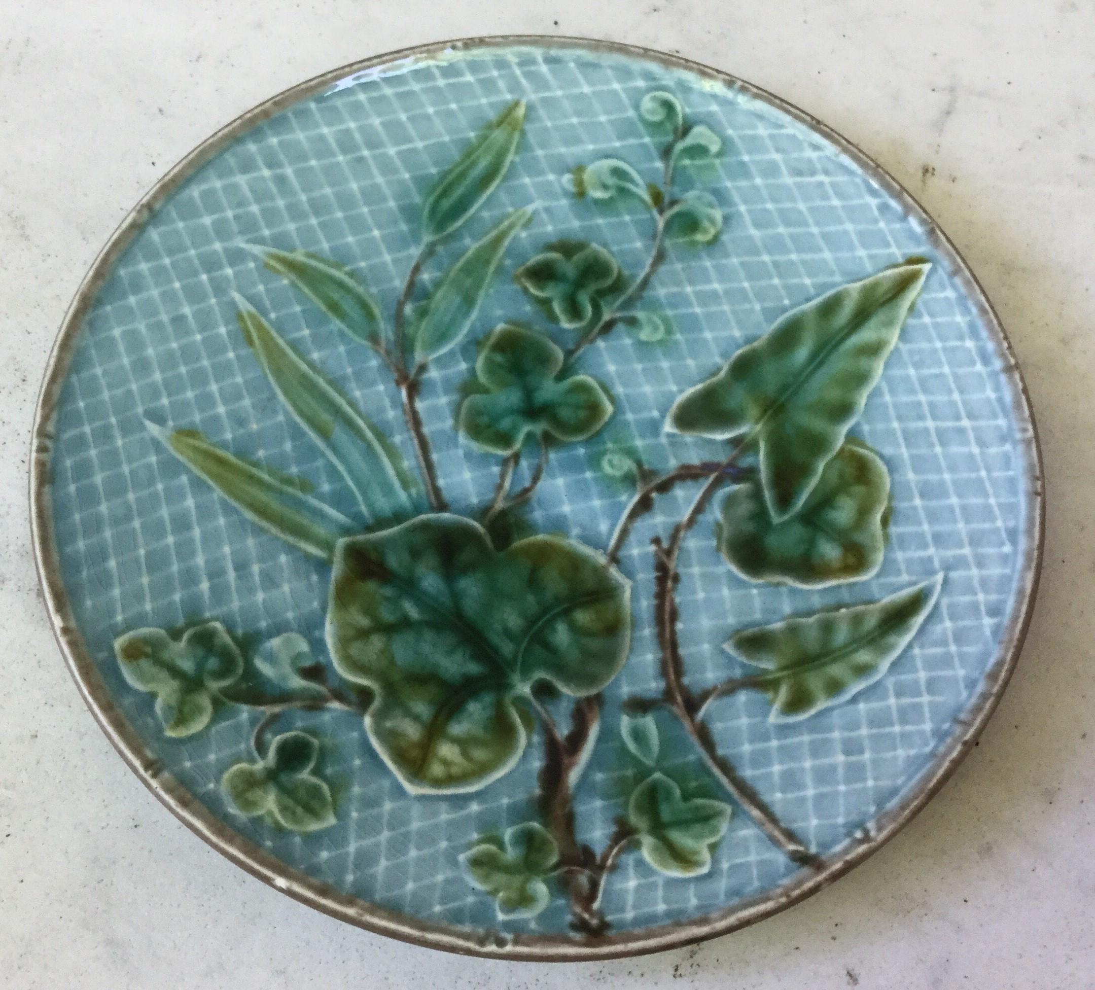 Small Majolica plate with green leaves, circa 1890.