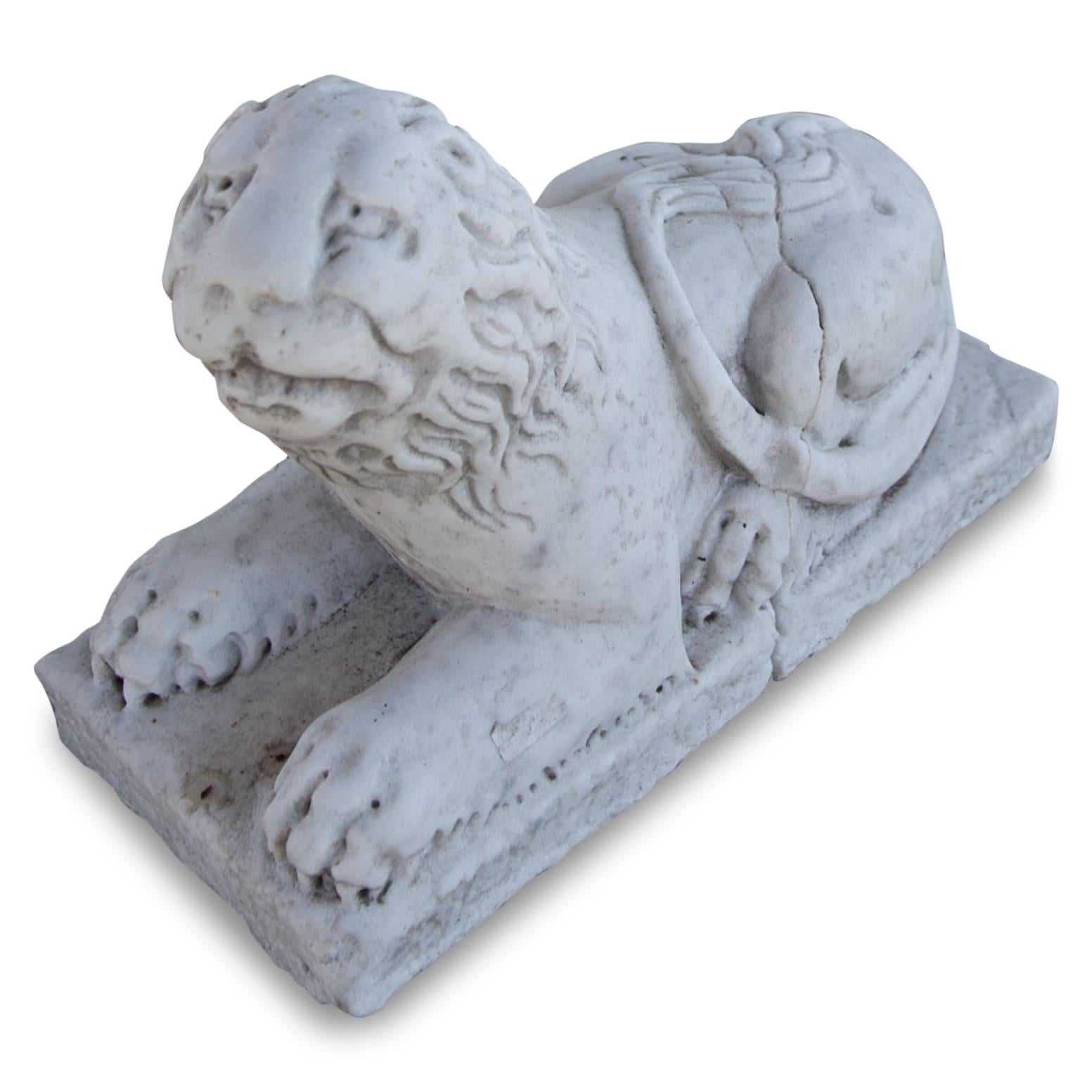 Small pair of hand-carved marble lions in an antique style.