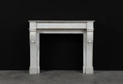 Pequeña chimenea de mármol Luis XVI