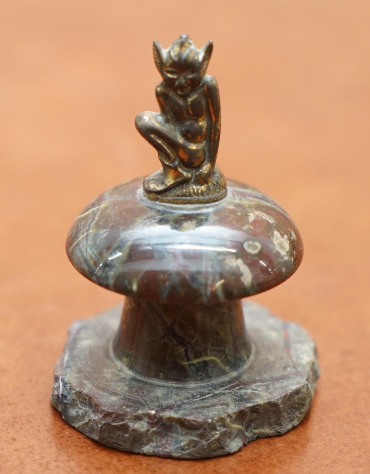 English Small Marble Statue with a Little Bronze Pixy Sitting on Top of a Polished Rock