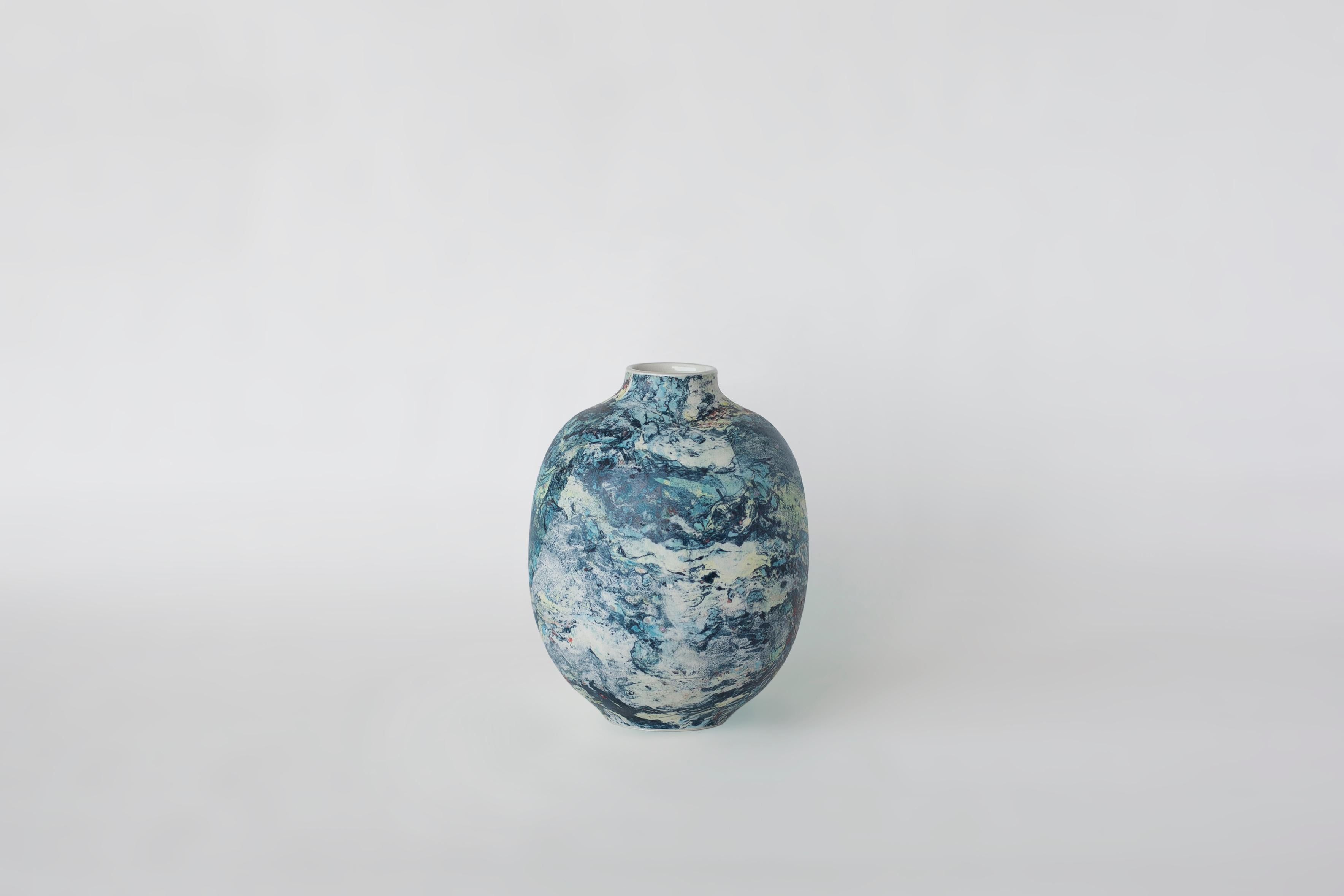 Small marble vase by Veronika Švábeníková.
Dimensions: 14 × 14 × 17.5 cm.
Materials: ceramic.

A petit version of a truly unique collection of ceramic vases that will enhance any decor.

The way she makes them is truly unique. She takes common
