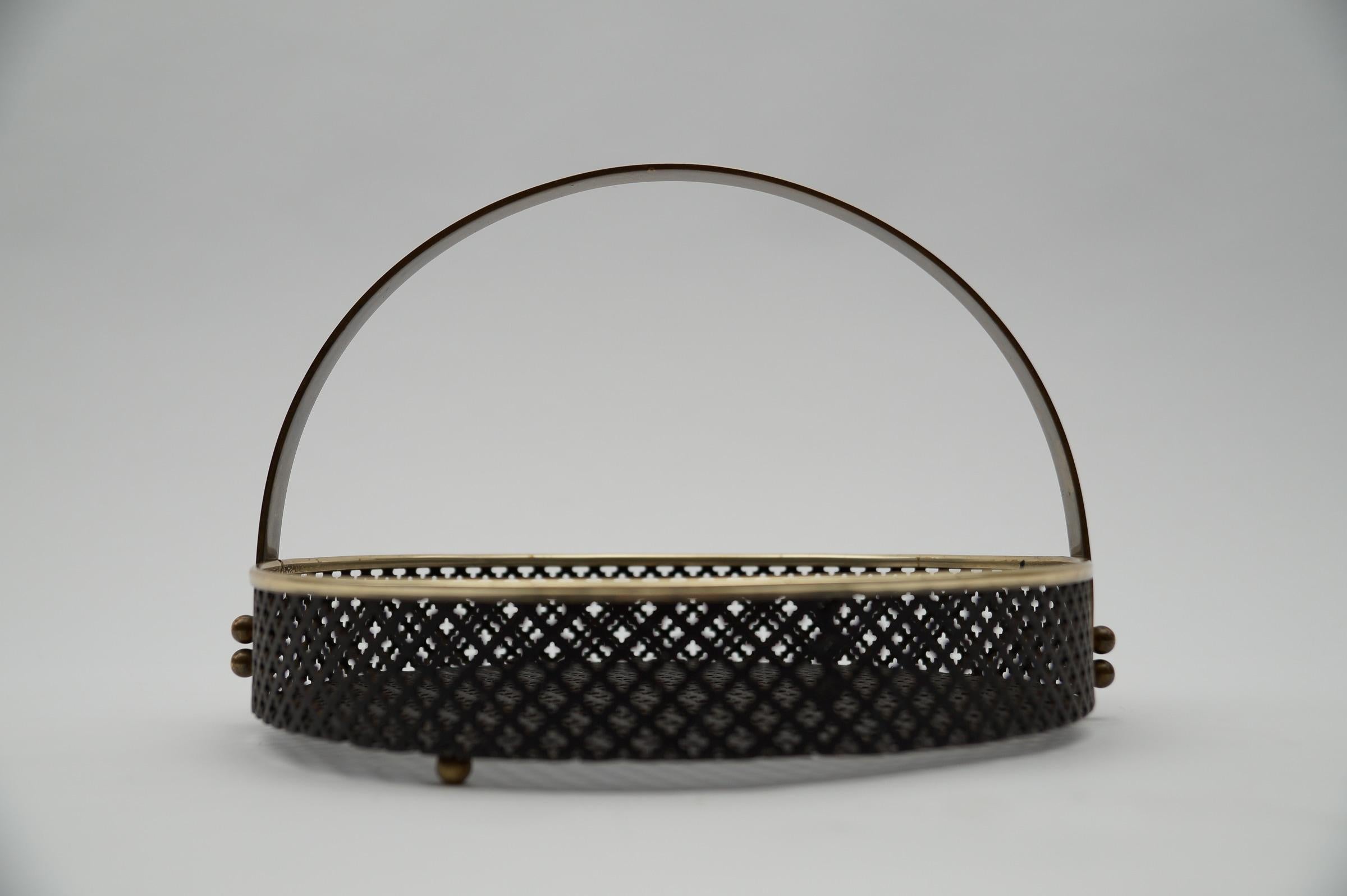 Mid-20th Century Small Mategot style perforated metal portable serving tray with brass handle For Sale