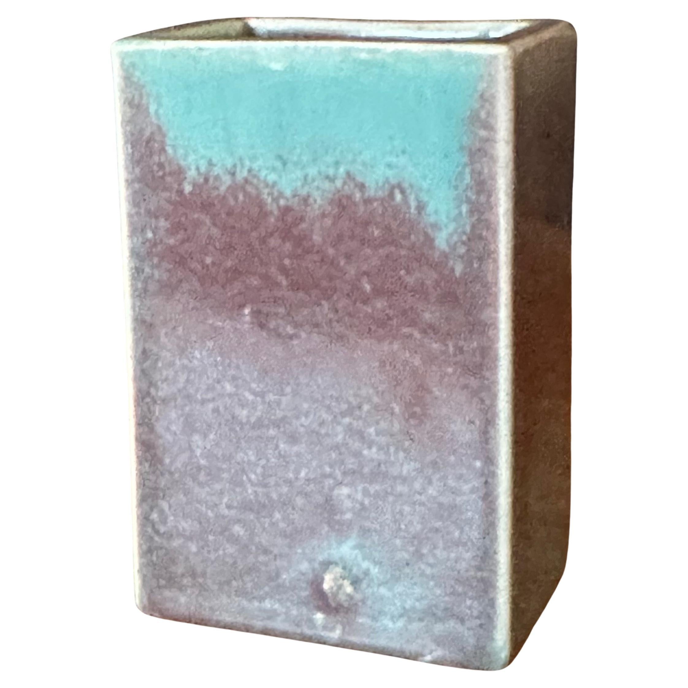 Small MCM drip glaze ceramic vase by Ken's of California, circa 1960s. This vase is in excellent used condition with no chips or cracks and measures 2.75