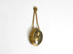 Small mechanical original Mid Century Atlanta wall clock with 10-day movement