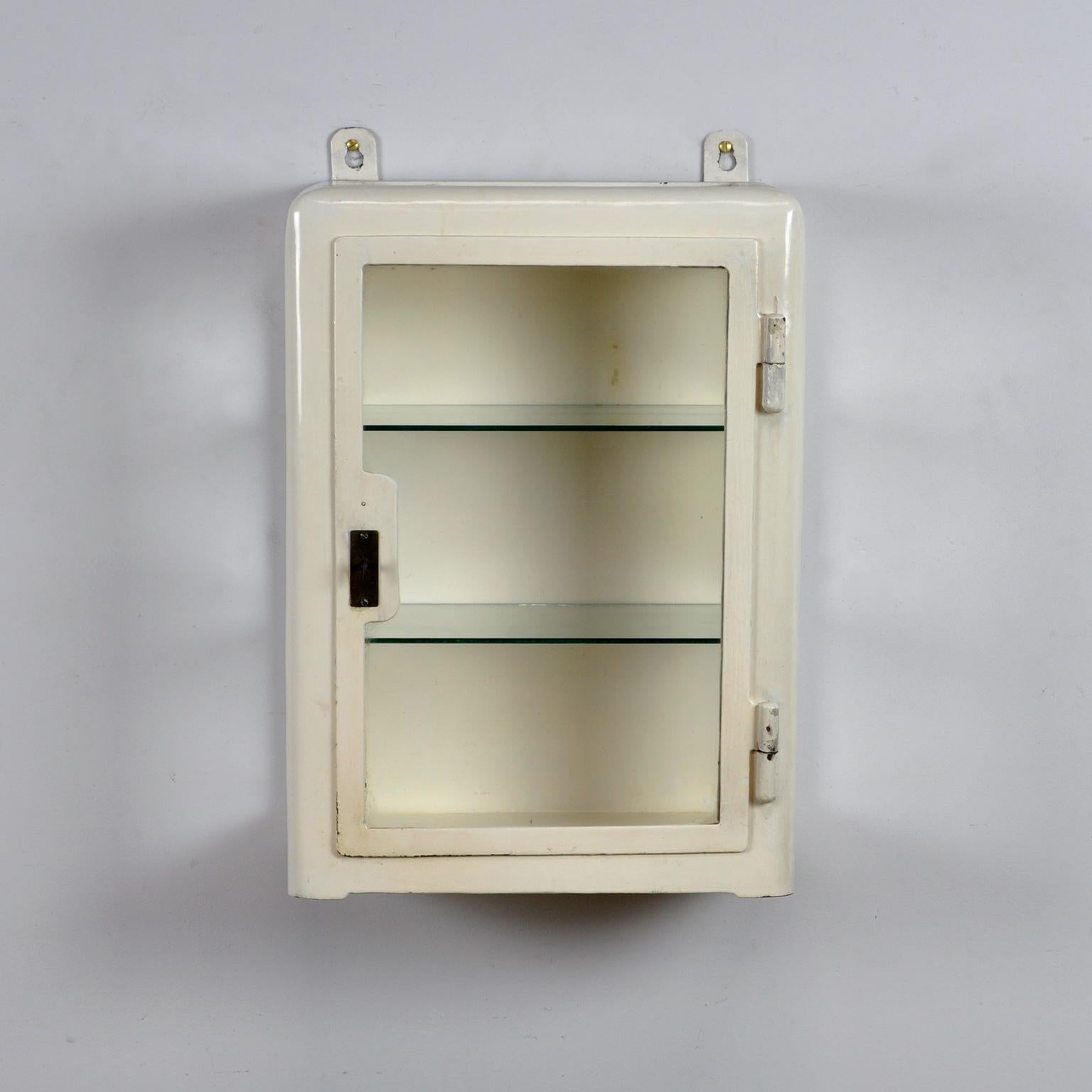 Medicine cabinet from the 1940s. The cabinet is produced in Hungary and is made of thick iron and glass. From a hospital in Budapest.