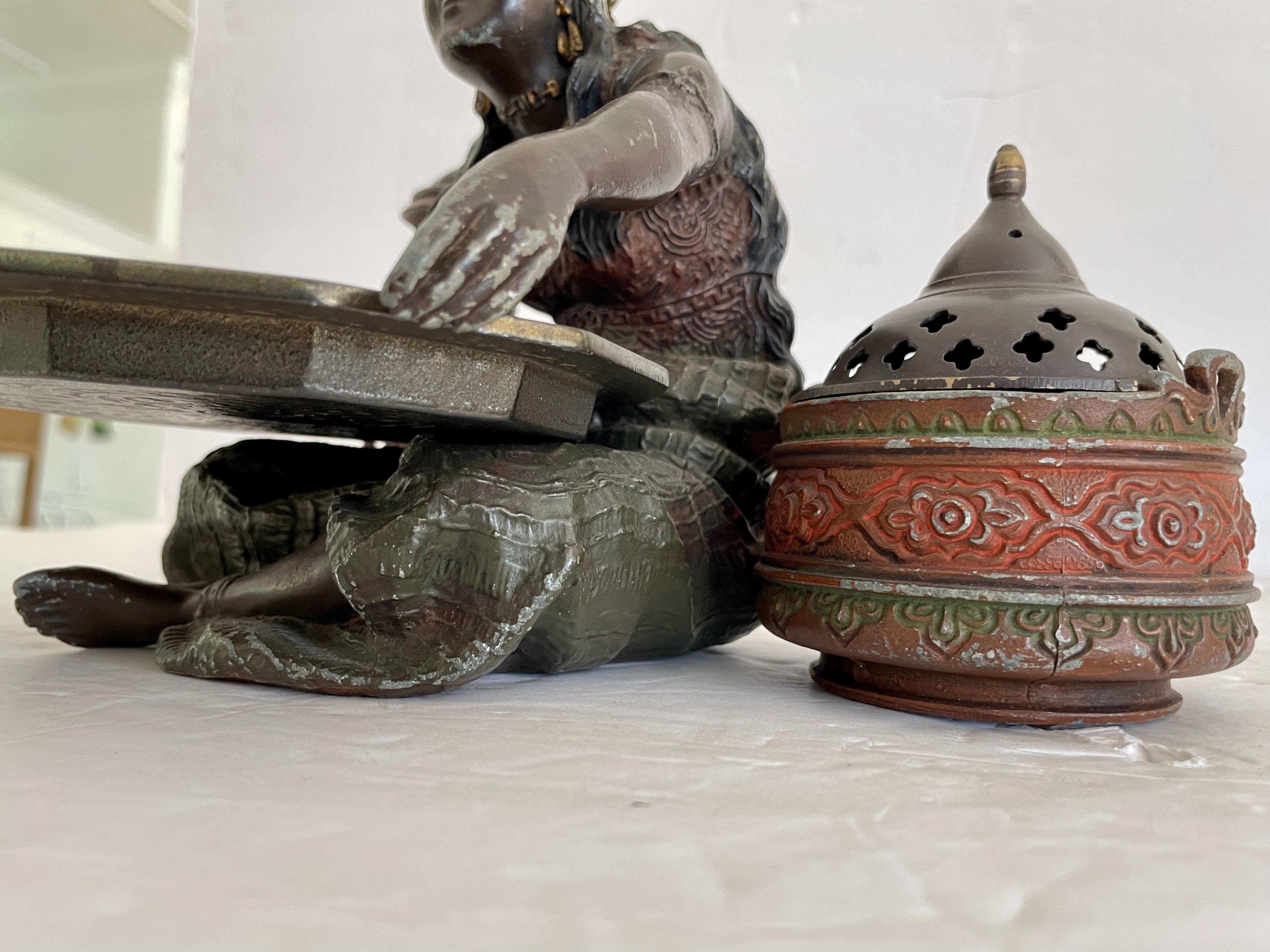 Small Metal Figurine of a North African Vendor For Sale 5