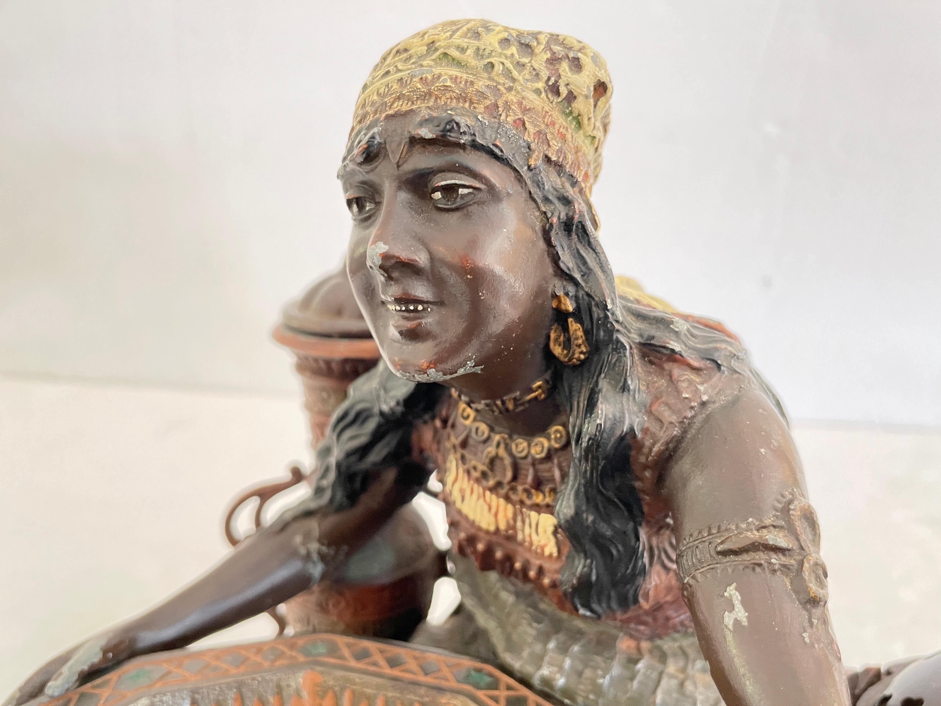 Small Metal Figurine of a North African Vendor For Sale 3