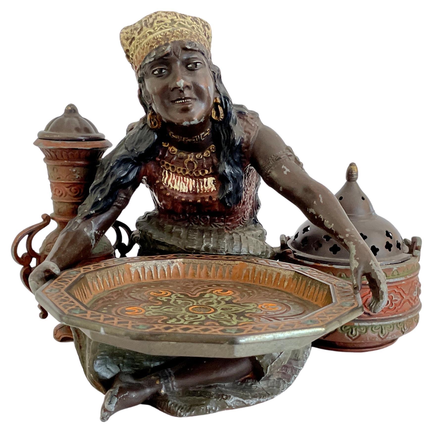 Petite figurine en métal d'un vendeur nord-africain en vente