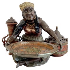 Vintage Small Metal Figurine of a North African Vendor
