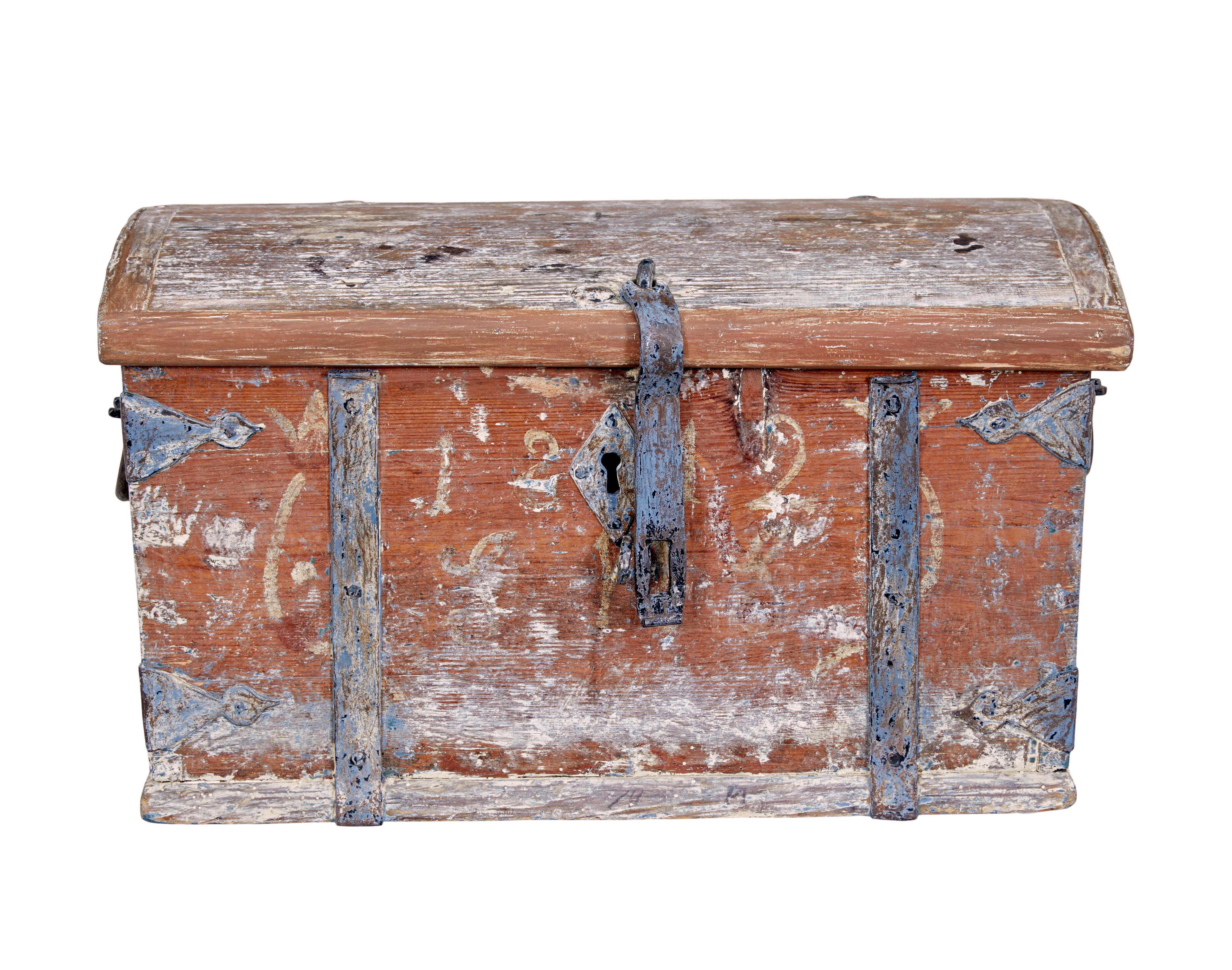 Small mid 19th century swedish painted pine strong box circa 1842.

Beautiful small scandinavian strong box, presented with scraped back paint to reveal original.  Feintly still baring its 1842 date, slight blue wash on the metalwork, contrasting