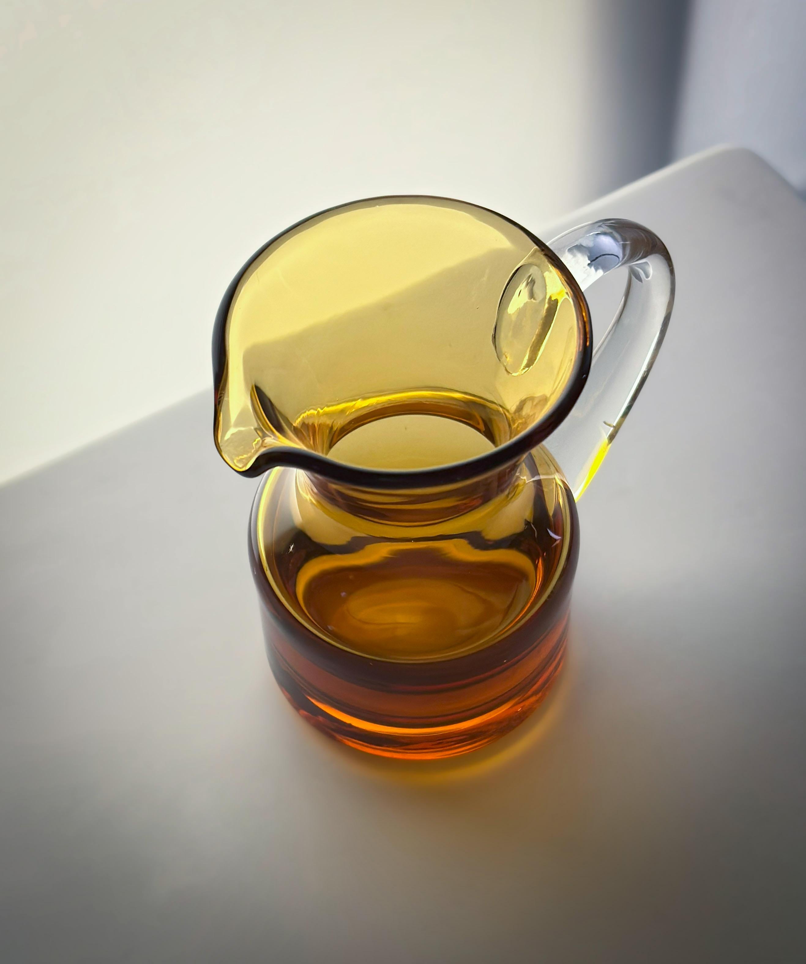 Hand-Crafted Small Mid-Century Amber Glass Milk Jug by Whitefriars, England For Sale