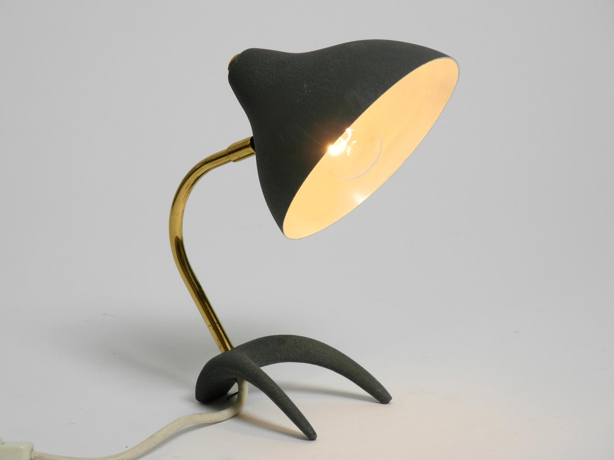 Small Mid Century crow's foot table lamp by Louis Kalff in very good condition For Sale 8