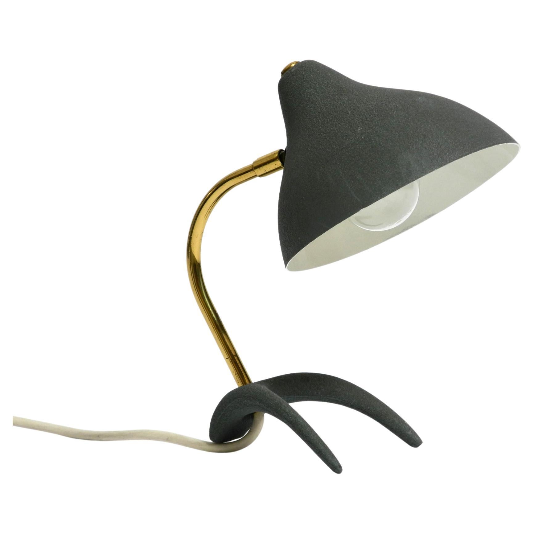 Small Mid Century crow's foot table lamp by Louis Kalff in very good condition For Sale