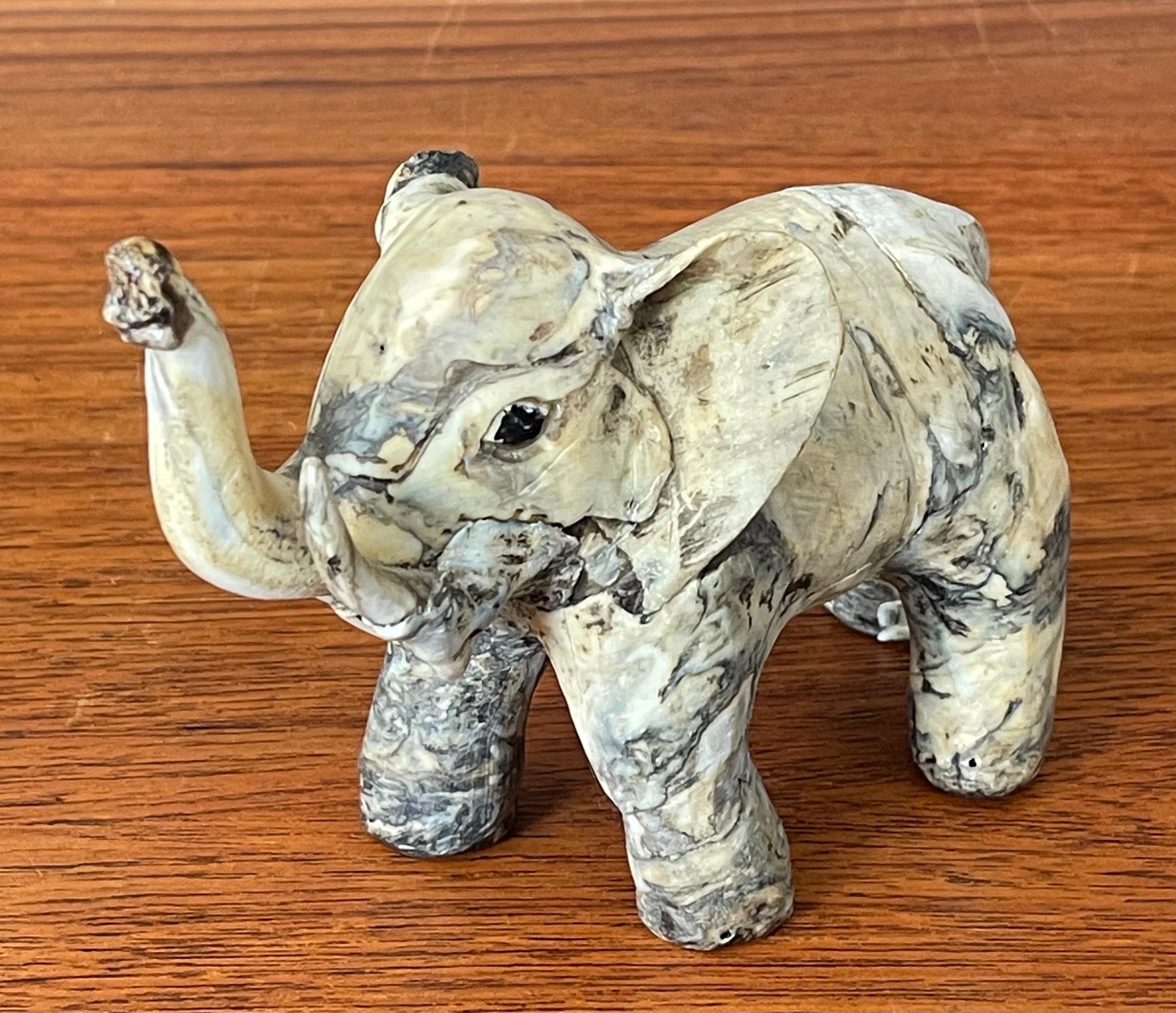 A very cool MCM elephant sculpture, circa 1970s. The piece is in very good vintage condition with no chips or cracks and measures 6