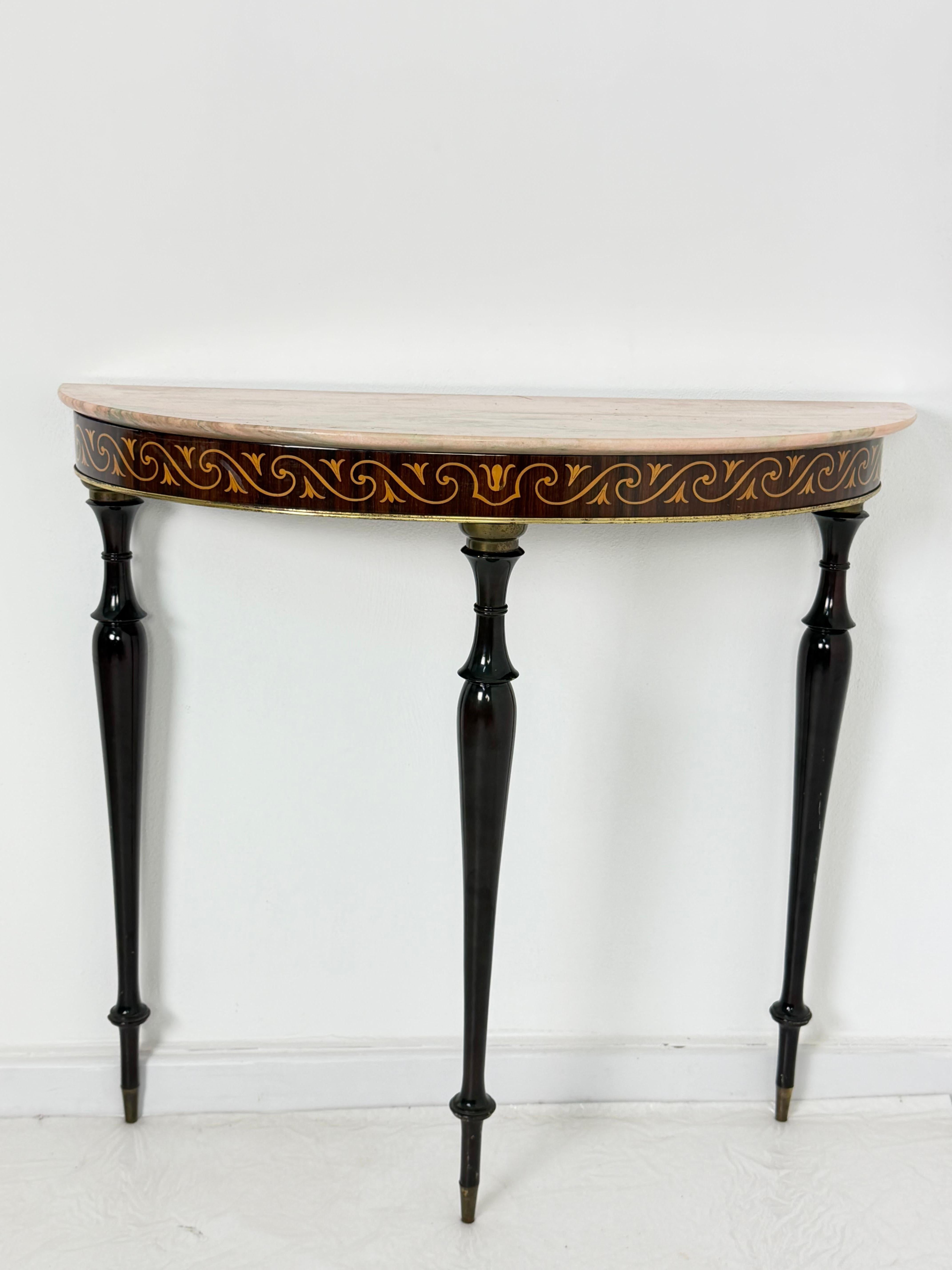 Small mid-century Italian console table in the style of P. Buffa, 1950s
Portuguese Rose marble top, brass accessories, decorations.
Good condition.

Width 89 cm, depth 32 cm, height 82 cm.

We guarantee fast and insured shipping with suitable