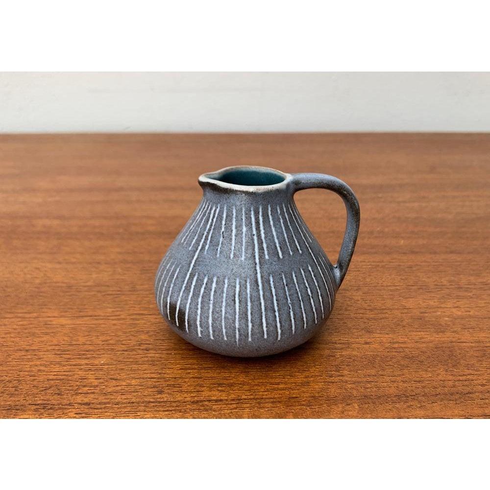 Small Mid-Century Minimalist Carafe Vase from Marschner Kunsttöpferei, 1960s, in Very Good conditions. Designed 1960 to 1969 This piece has an attribution mark.

Additional information:
Materials: Ceramic
Color: Gray
Styles: Mid-Century Modern,