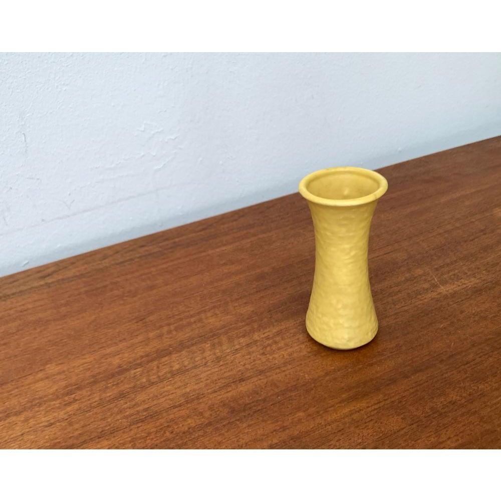 Small Mid-Century Minimalist WGP West German Pottery Vase, 1960s, in Very Good conditions. Designed 1960 to 1969.

Additional information:
Materials: Ceramic
Style: Mid-Century Modern, Minimalist
Country of Origin: Germany
Color: Yellow
Item Type: