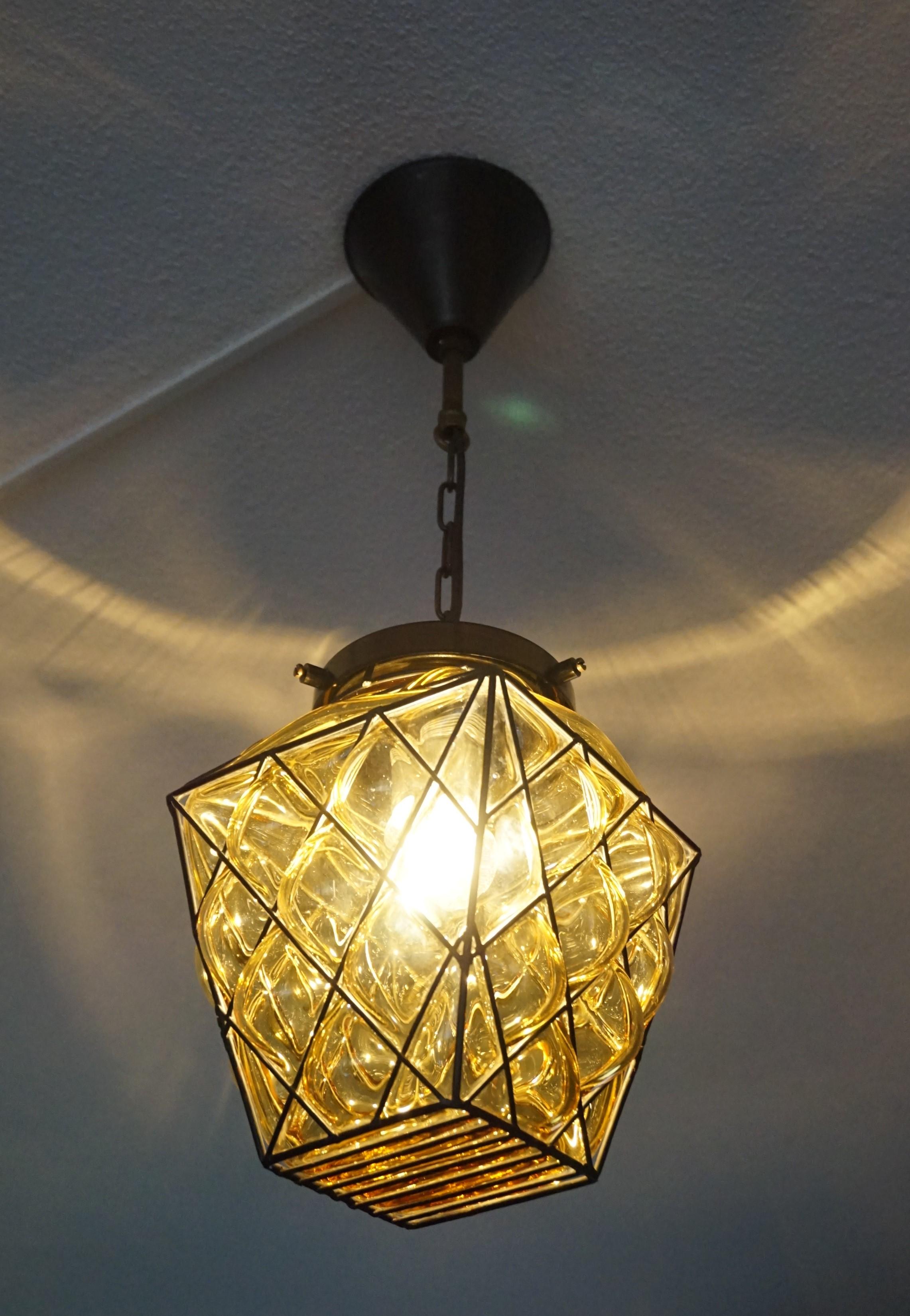 Small Mid-Century Modern Italian Mouthblown Amber Glass into Metal Frame Pendant For Sale 4