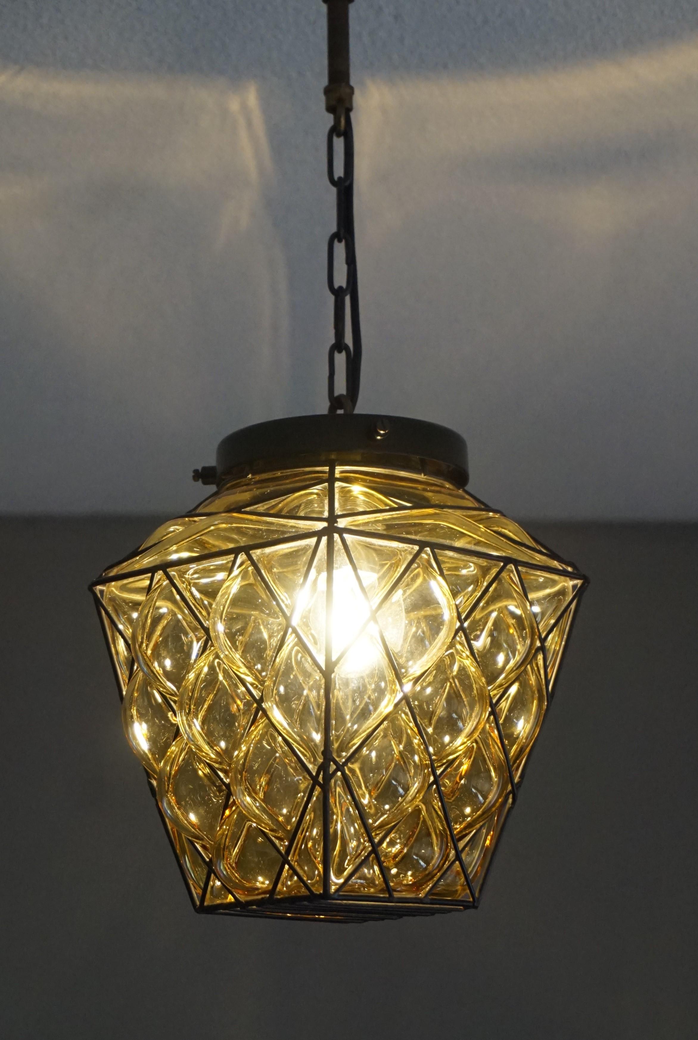 Small Mid-Century Modern Italian Mouthblown Amber Glass into Metal Frame Pendant For Sale 1