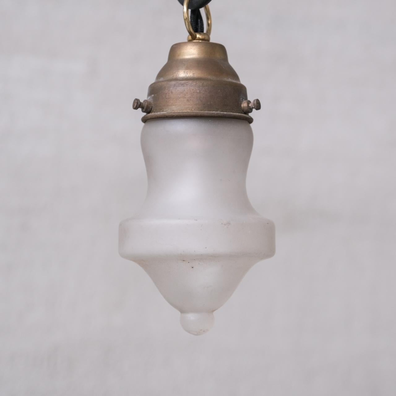 French Small Mid-Century Opaque Glass and Brass Pendant Lights (4 available) For Sale