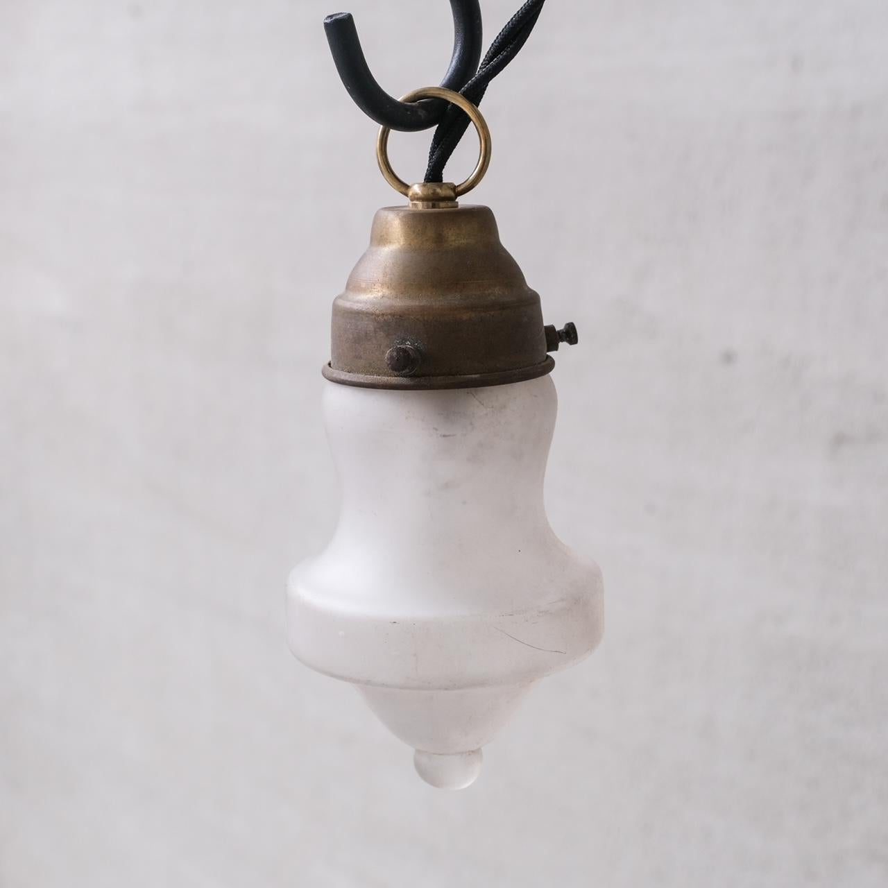 Small Mid-Century Opaque Glass and Brass Pendant Lights (4 available) For Sale 3