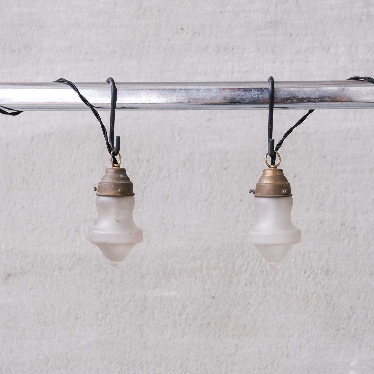 Small Mid-Century Opaque Glass and Brass Pendant Lights (4 available) For Sale 4