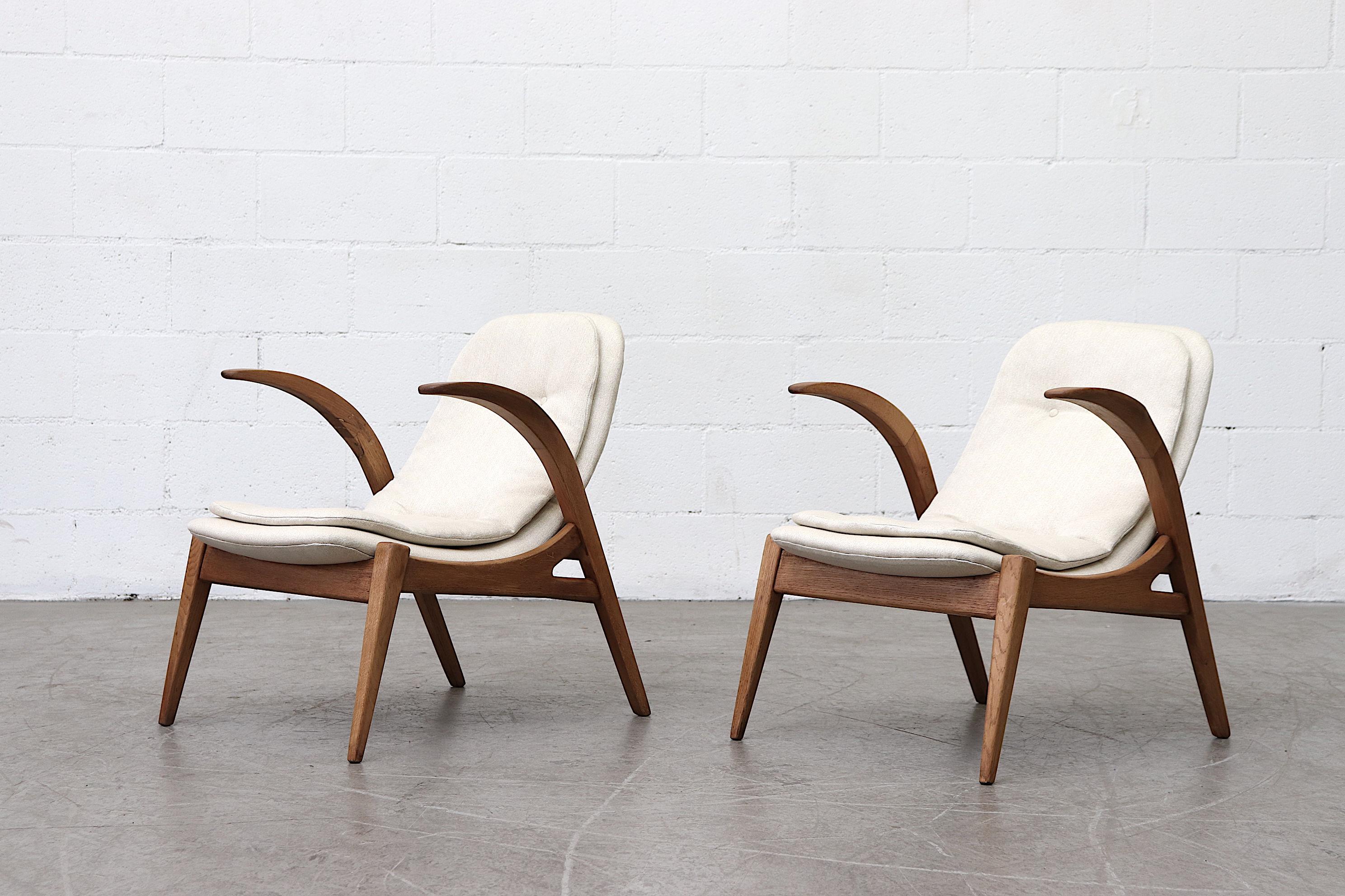 Small, Child Sized Sophisticated Mid-Century Lounge Chair with Carved Penguin-Like Arms. White Upholstery with Additional Cushioned lining for Comfort and Support. Frames in Original Condition with Wear Consistent with their Age. Priced