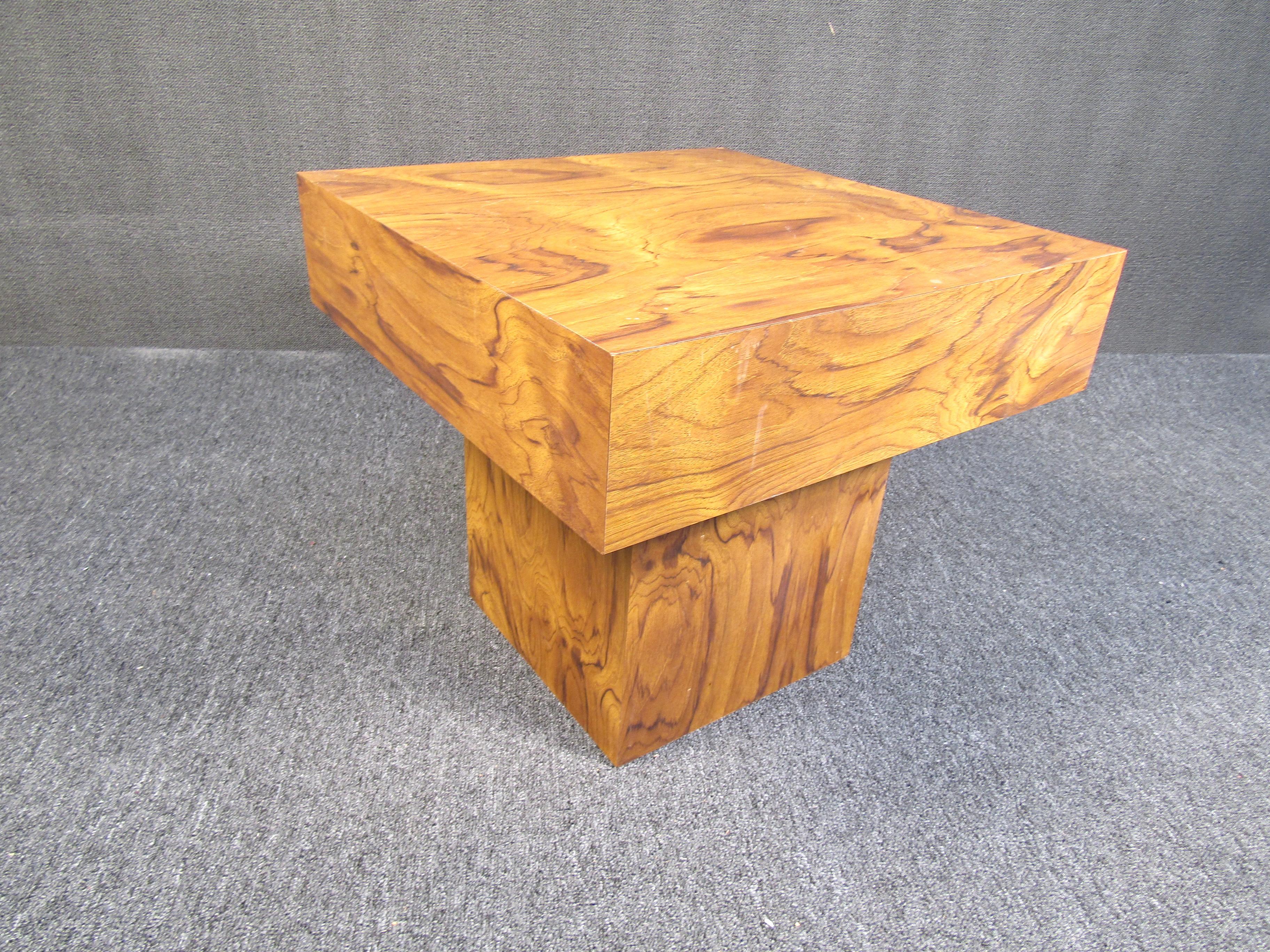 This charming walnut table is perfect for either a small coffee table or a side table. Featuring beautiful dark grain walnut wood and a single leg design. Very sturdy in construction this piece will be a valued possession for years to come. Please