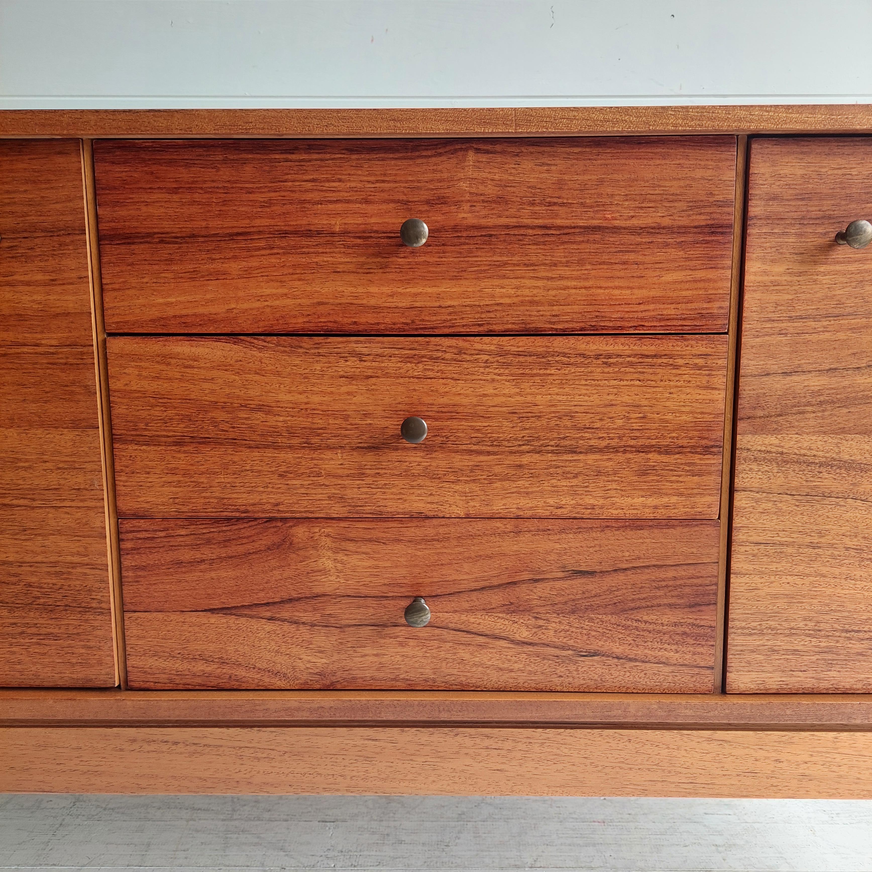 British Small Mid Century walnut sideboard by Peter Hayward for Uniflex, 1960s