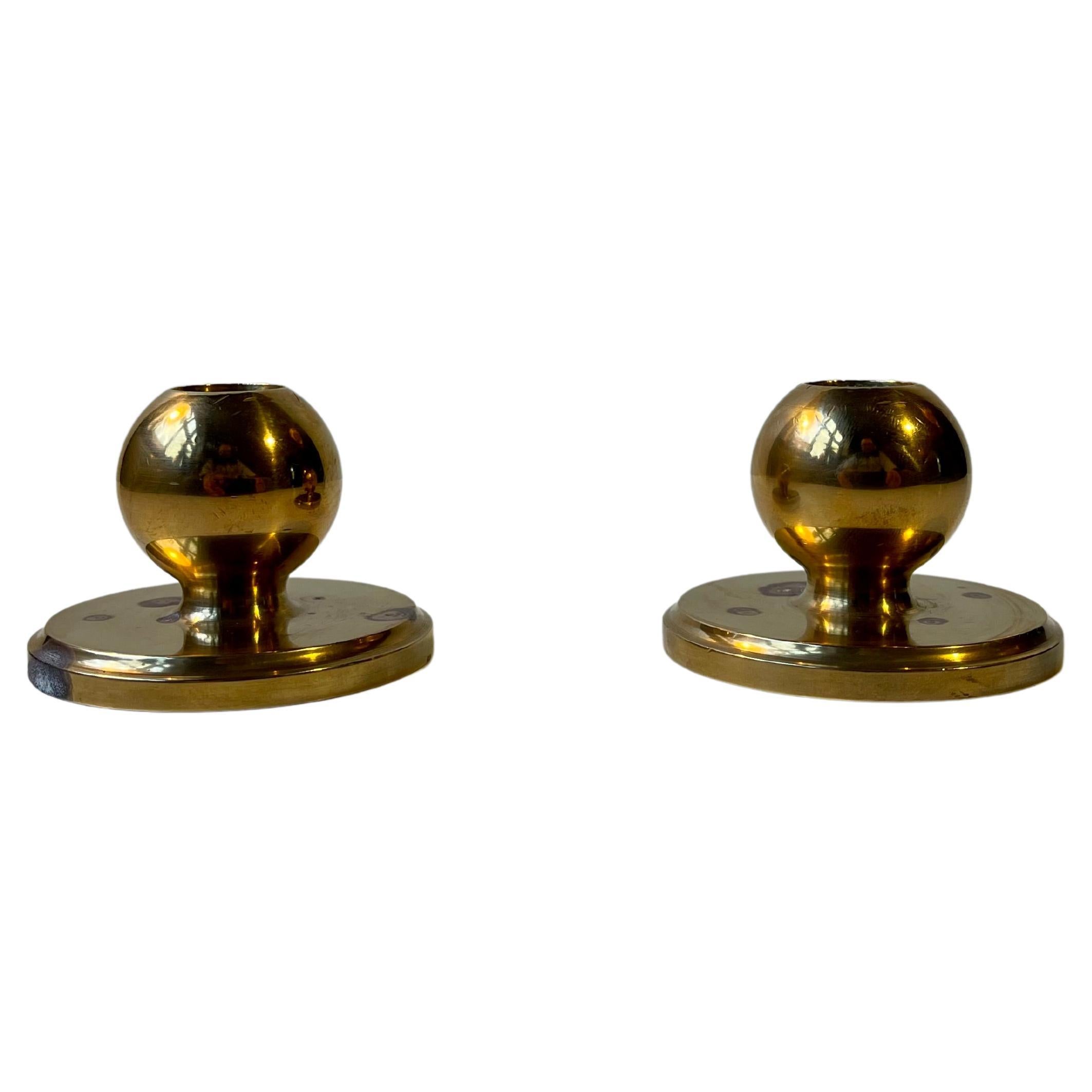 Small Midcentury Spherical Candlesticks in Bronze