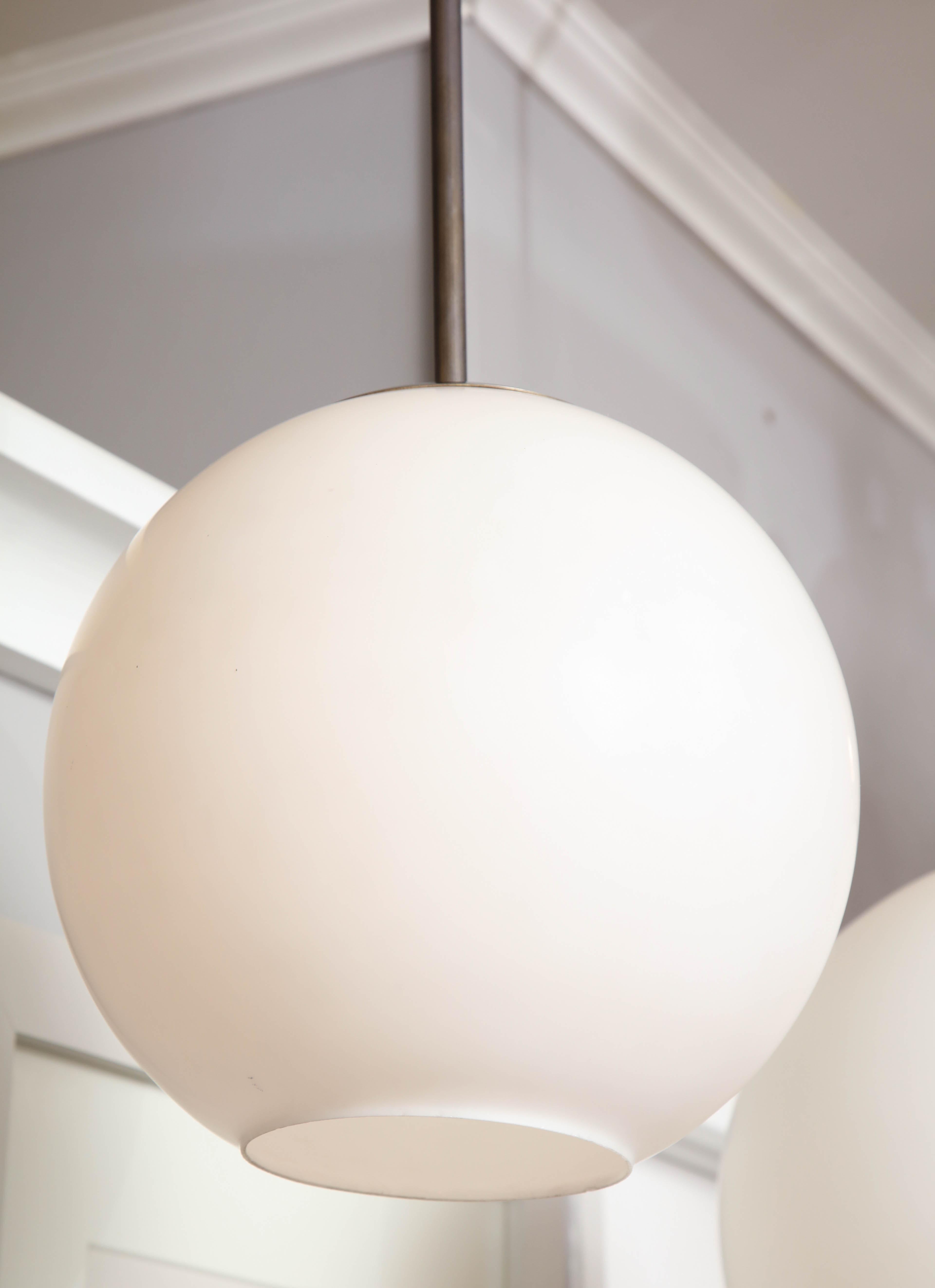 Small Vintage Milk Glass Globe Pendant with Antique Brass Canopy In Fair Condition For Sale In New York, NY