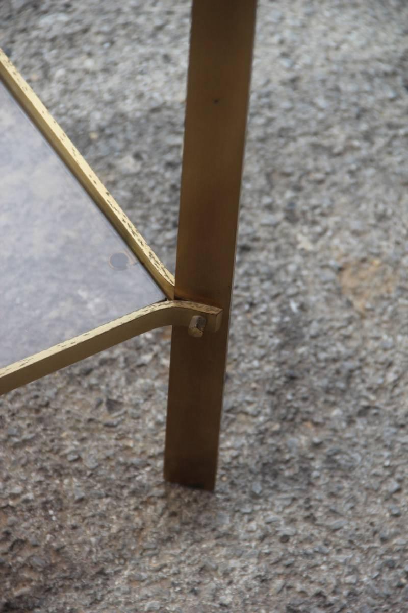 Small Minimalist shelf brass and shaped glass in satin brass, very rational and elegant design.