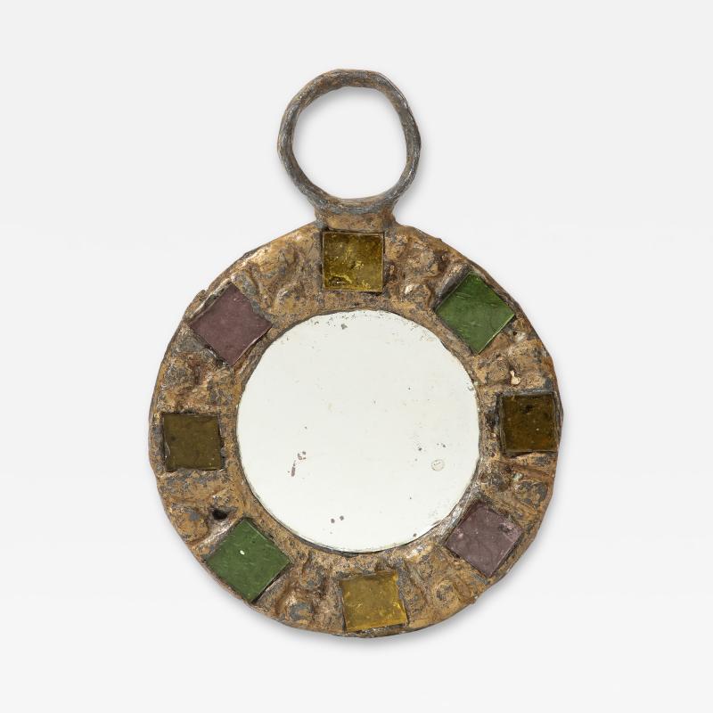 Small Mirror in the Manner of Line Vautrin, France, c. 1960

Small, elegant mirror in the manner of famed French designer Line Vautrin. The poured metal appears almost molten and has a silver-tone that compliments the lavender, light green and