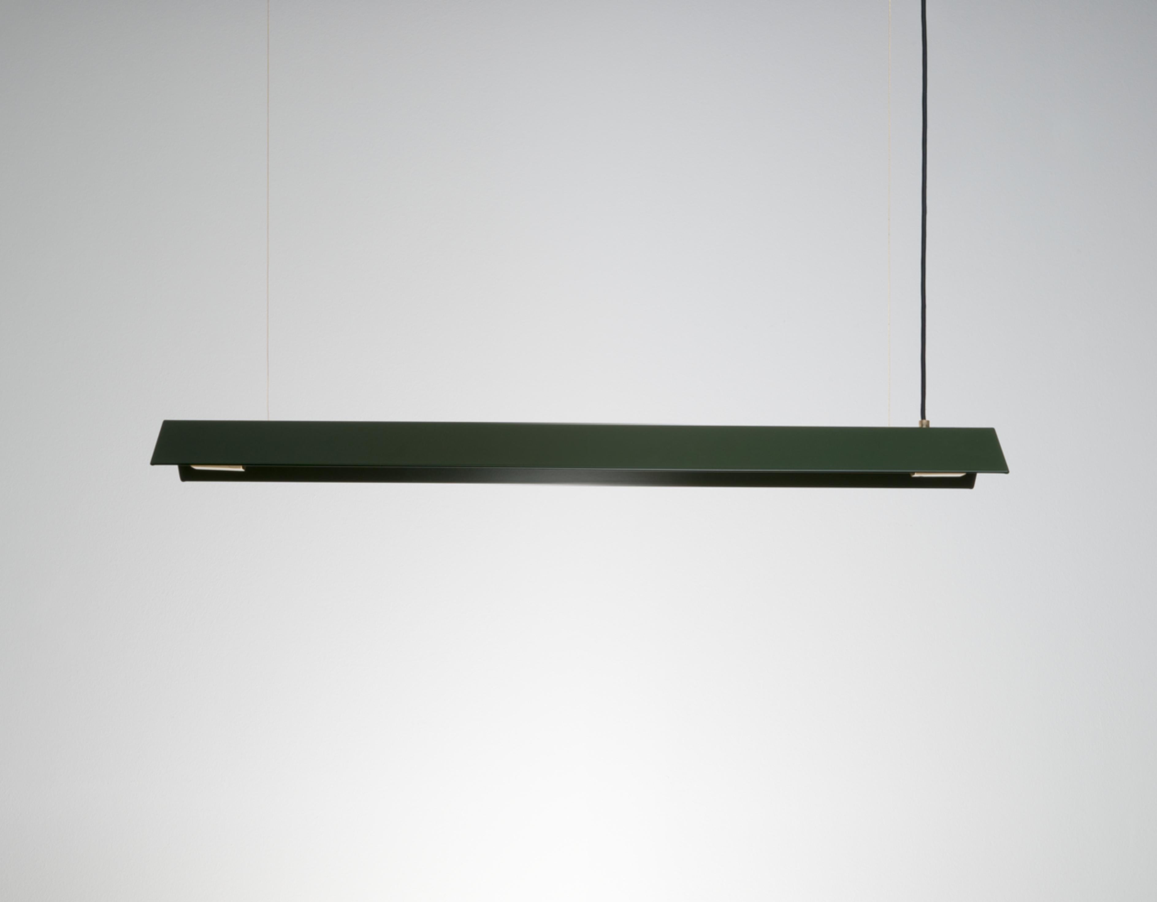 Small Misalliance Ex Bottle Green Suspended Light by Lexavala
Dimensions: D 16 x W 70 x H 8 cm
Materials: powder coated shade with details made of brass or stainless steel.

There are two lenghts of socket covers, extending over the LED. Two